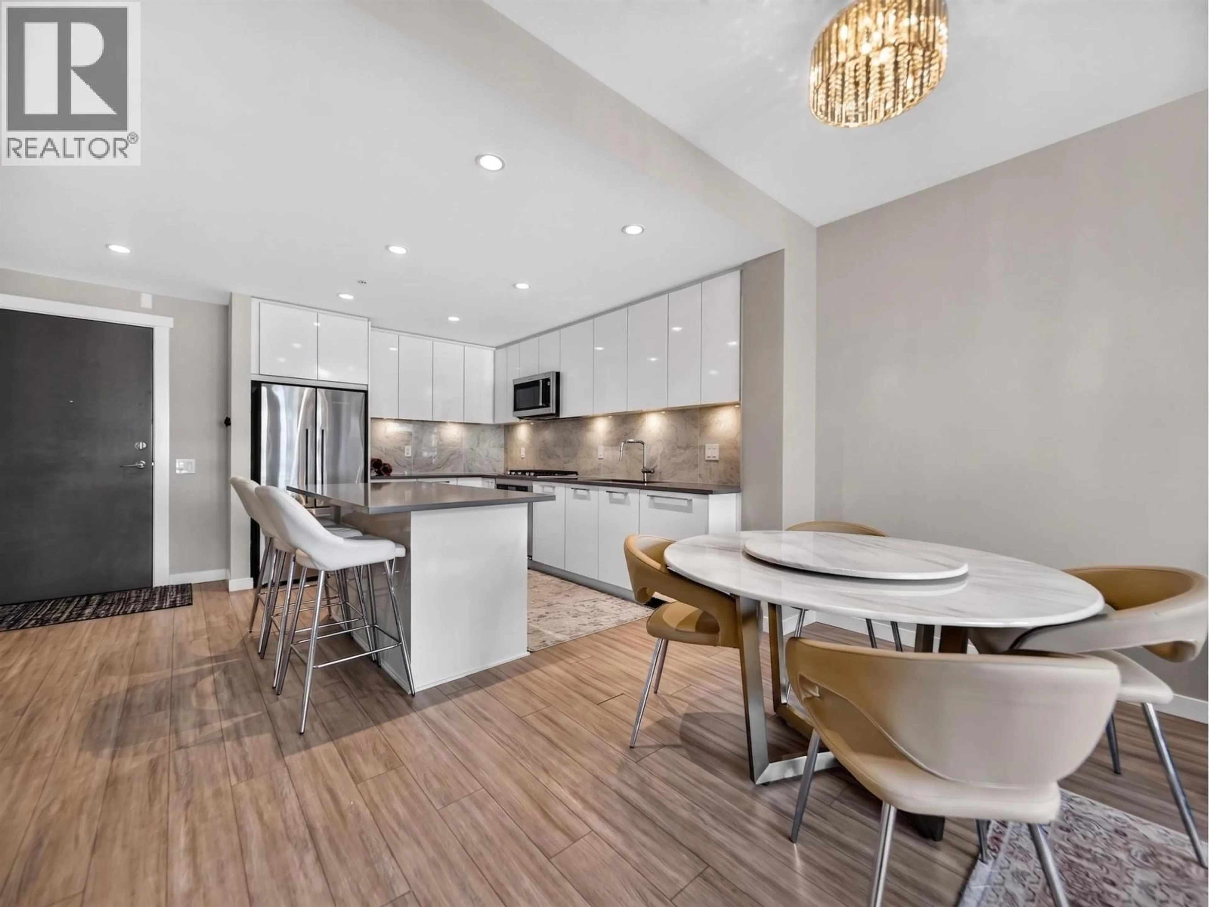 Open concept kitchen, unknown for 304 - 2663 LIBRARY LANE, North Vancouver British Columbia V7J0B9
