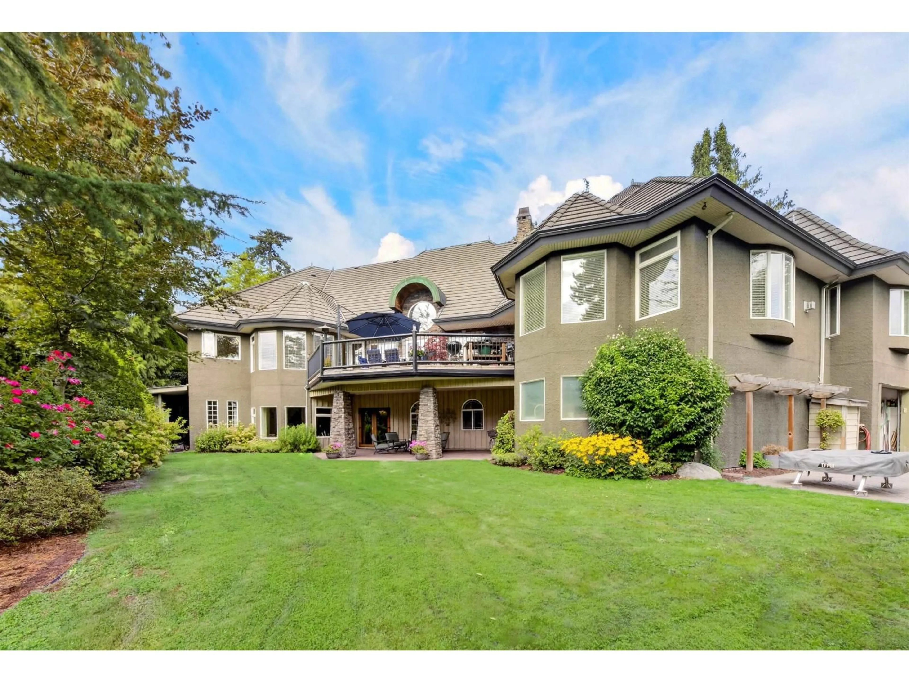 A pic from outside/outdoor area/front of a property/back of a property/a pic from drone, unknown for 18638 54A AVENUE, Surrey British Columbia V3S8L5