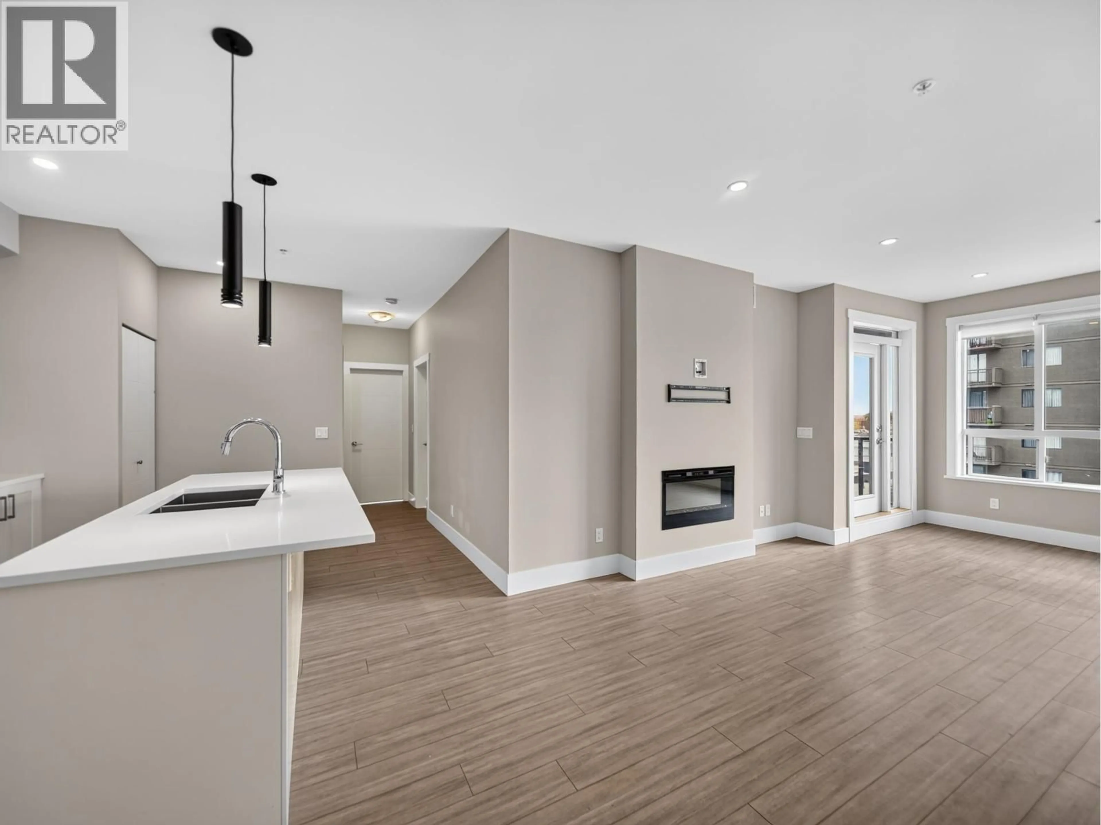 Open concept kitchen, unknown for 405 - 22335 MCINTOSH AVENUE, Maple Ridge British Columbia V2X3C2
