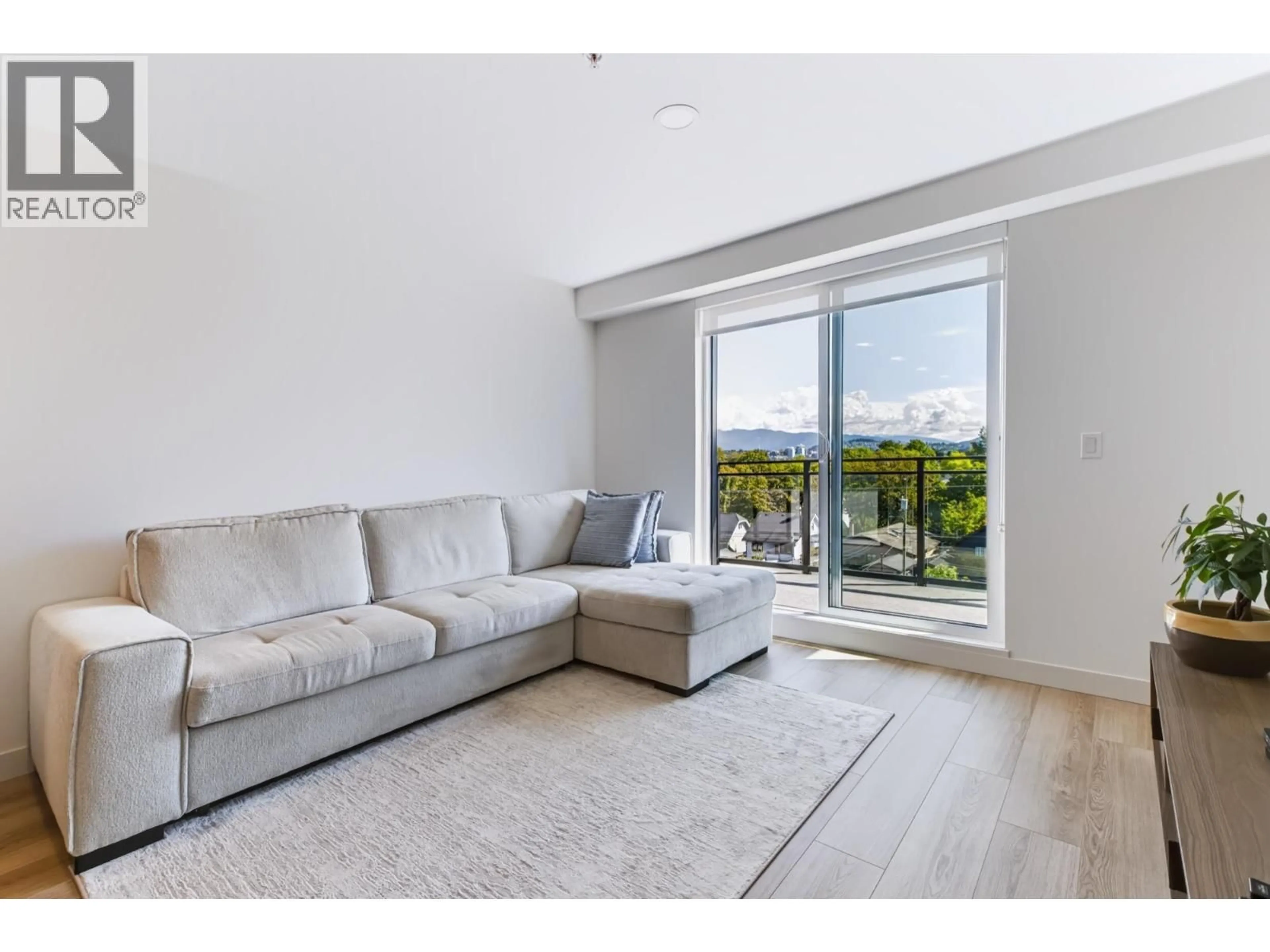 Living room with furniture, unknown for 406 - 2419 GRANT STREET, Vancouver British Columbia V5K3G5