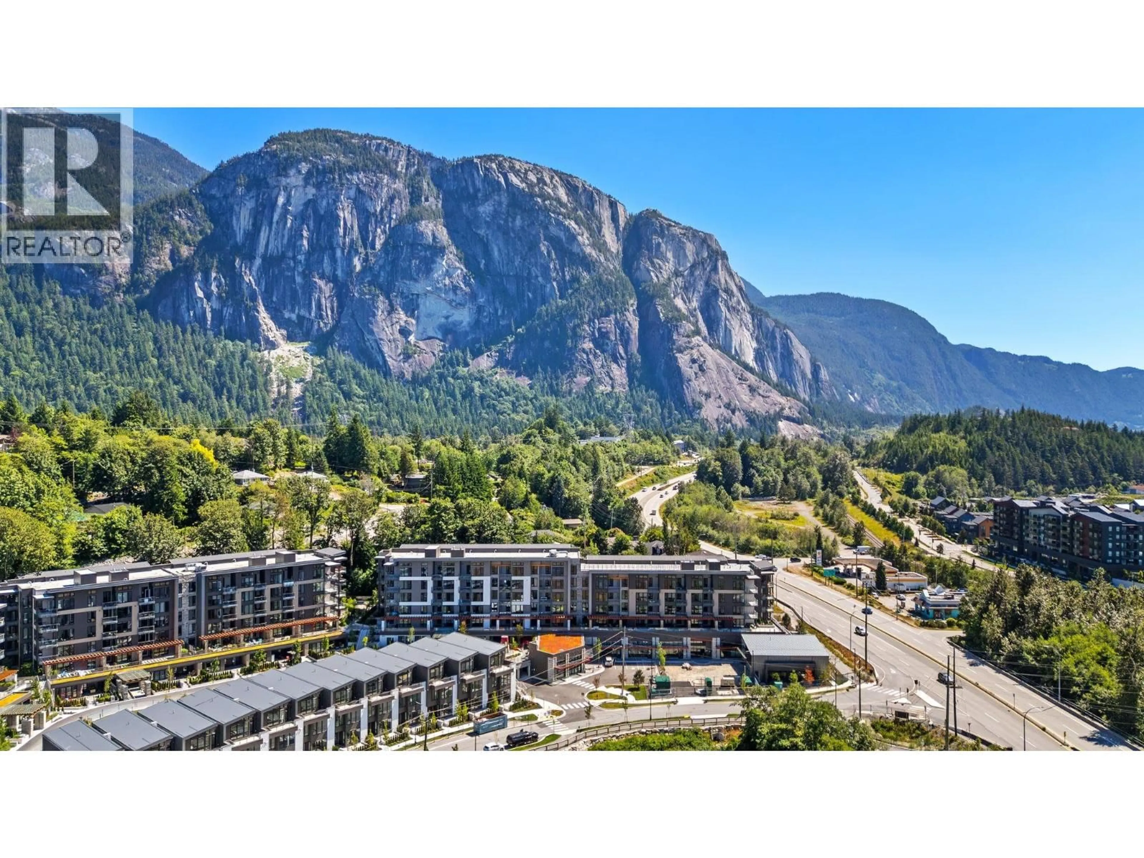 A pic from outside/outdoor area/front of a property/back of a property/a pic from drone, mountain view for 311 - 1500 SCOTT CRESCENT, Squamish British Columbia V8B1G5