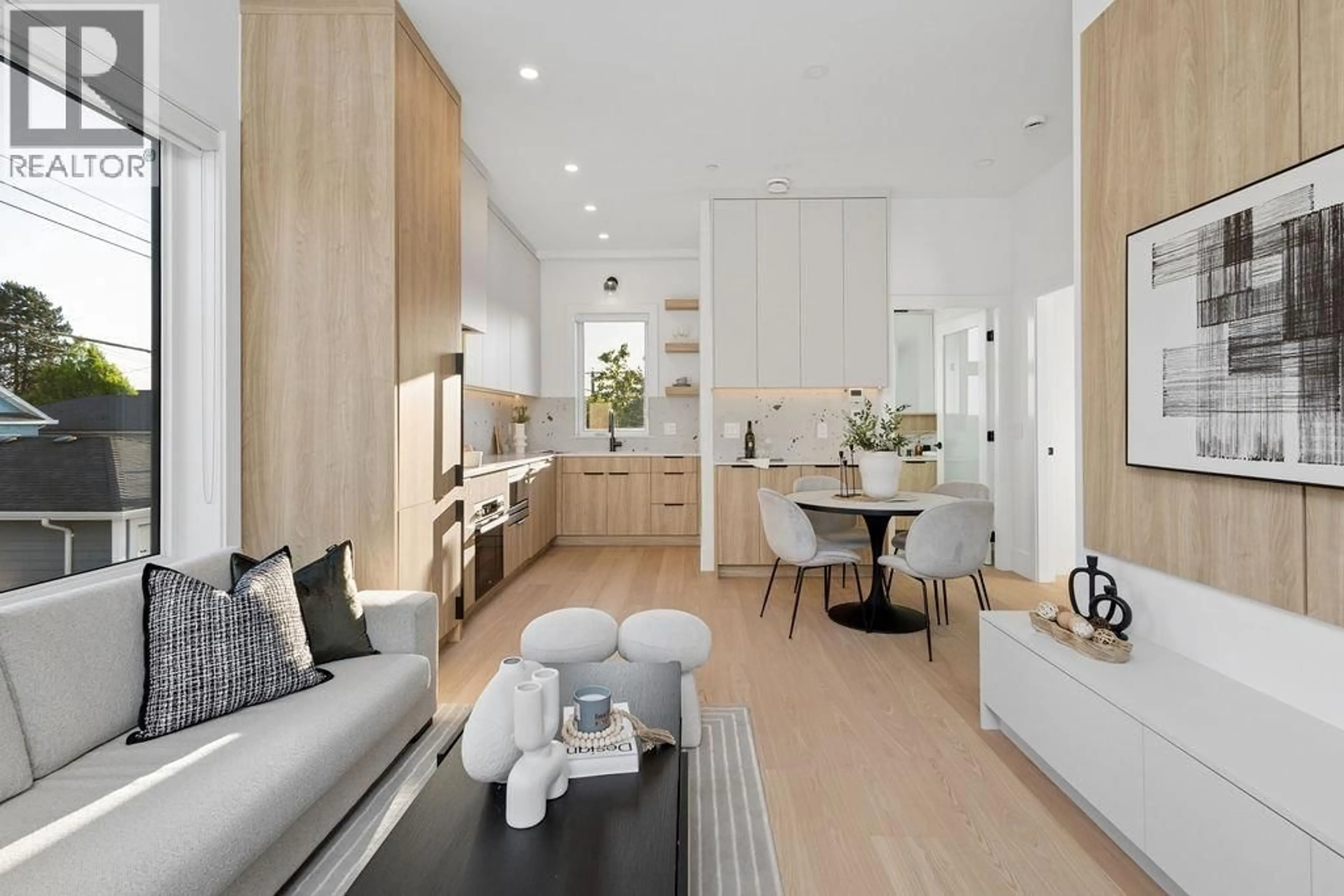 Open concept kitchen, wood/laminate floor for 2754 GRAVELEY STREET, Vancouver British Columbia V5K3J7