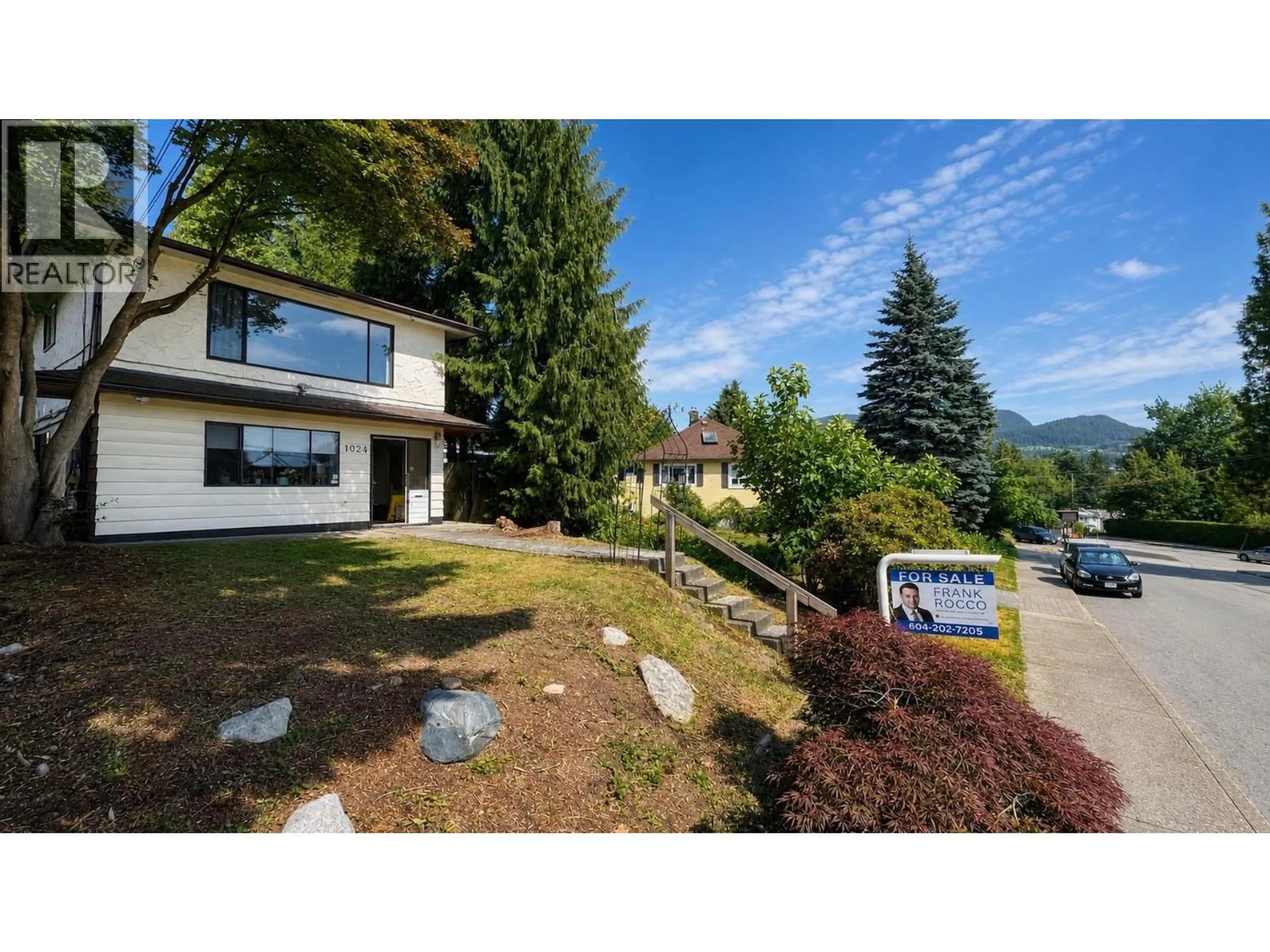 A pic from outside/outdoor area/front of a property/back of a property/a pic from drone, mountain view for 1024 RANCH PARK WAY, Coquitlam British Columbia V3C2H2