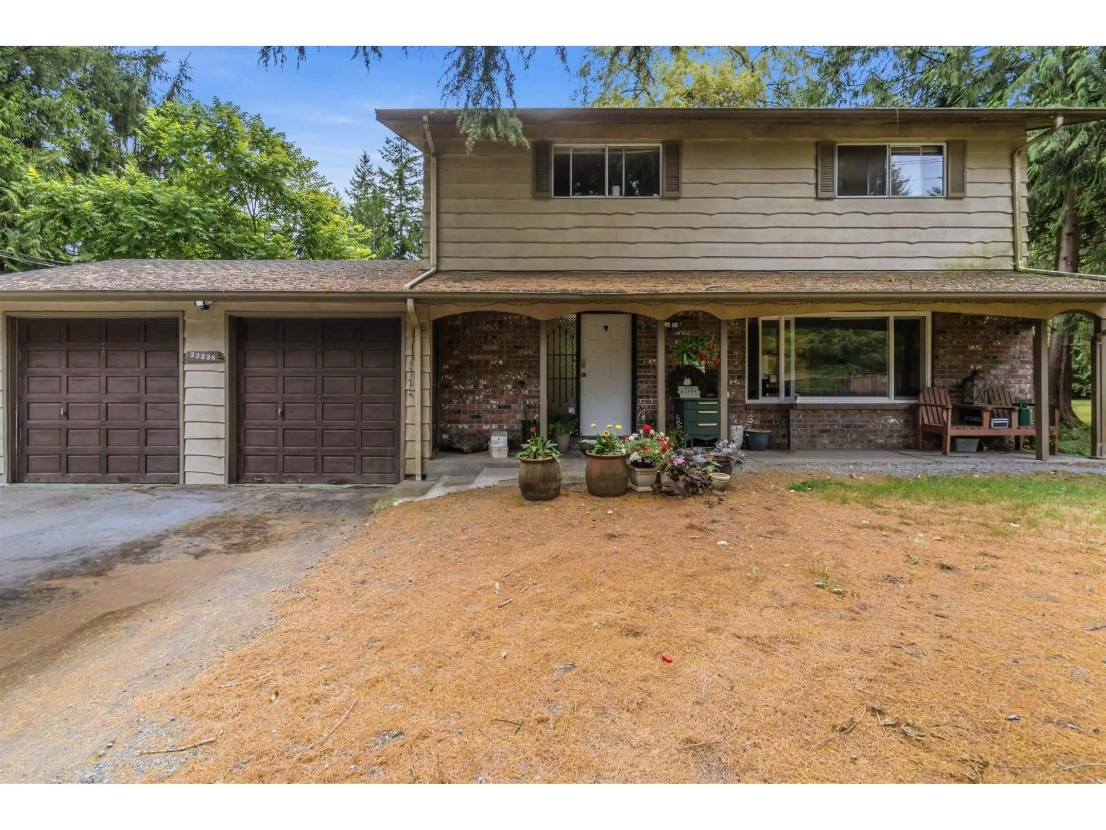 Home with vinyl exterior material, street for 23338 56 AVENUE, Langley British Columbia V2Z2P7
