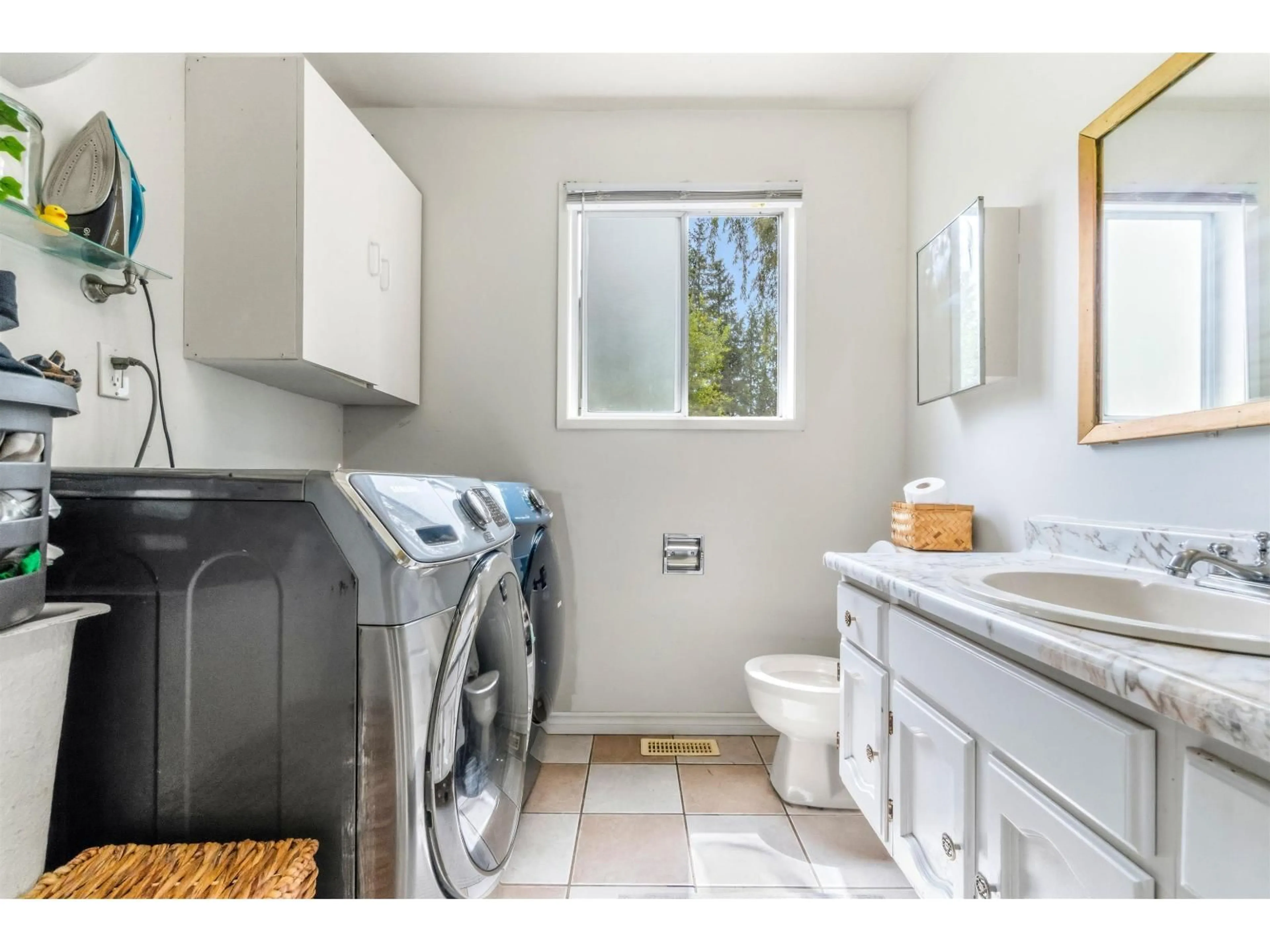 Laundry room for 23338 56 AVENUE, Langley British Columbia V2Z2P7