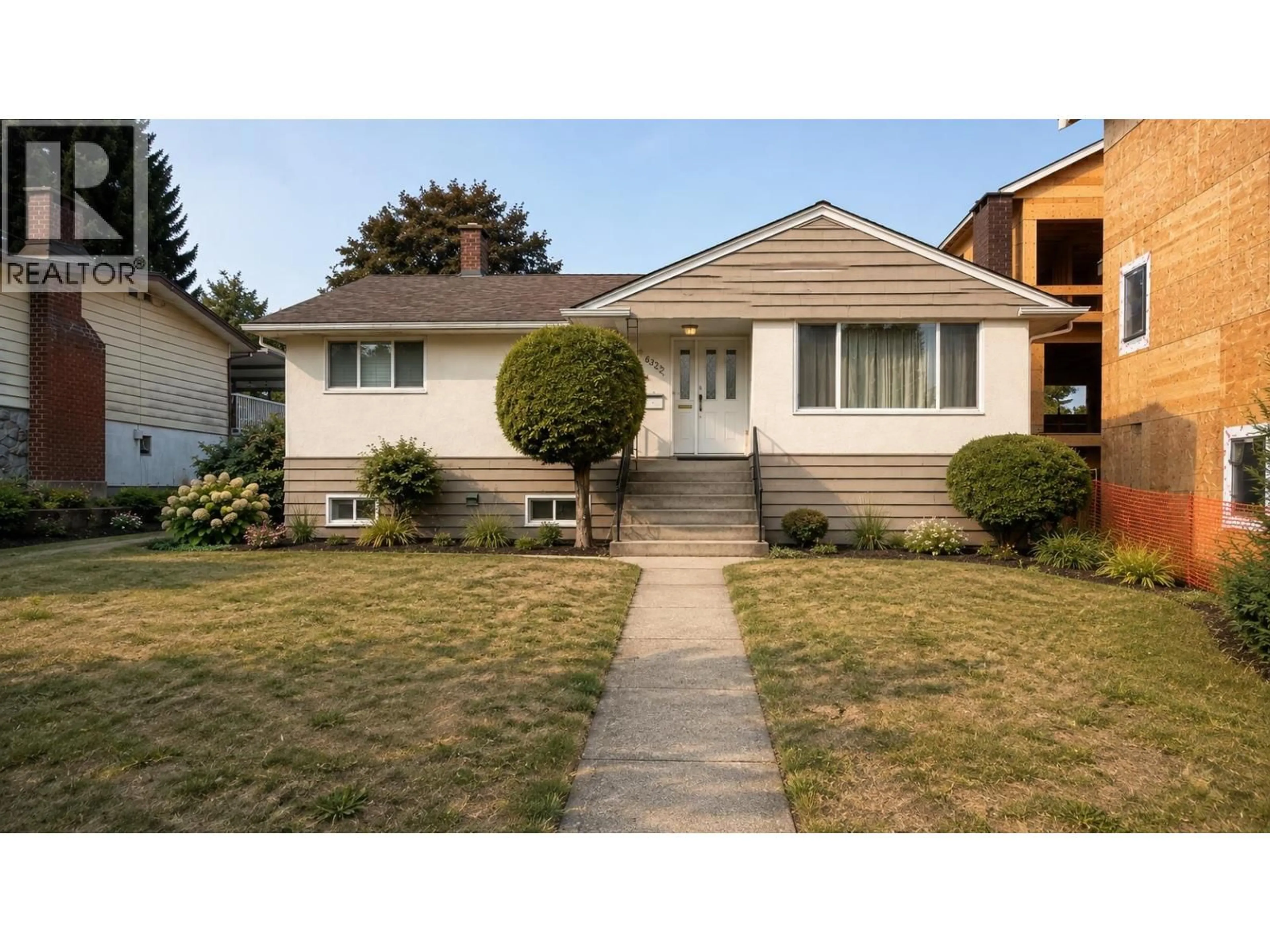 Home with vinyl exterior material, street for 6325 NAPIER STREET, Burnaby British Columbia V5B2B9
