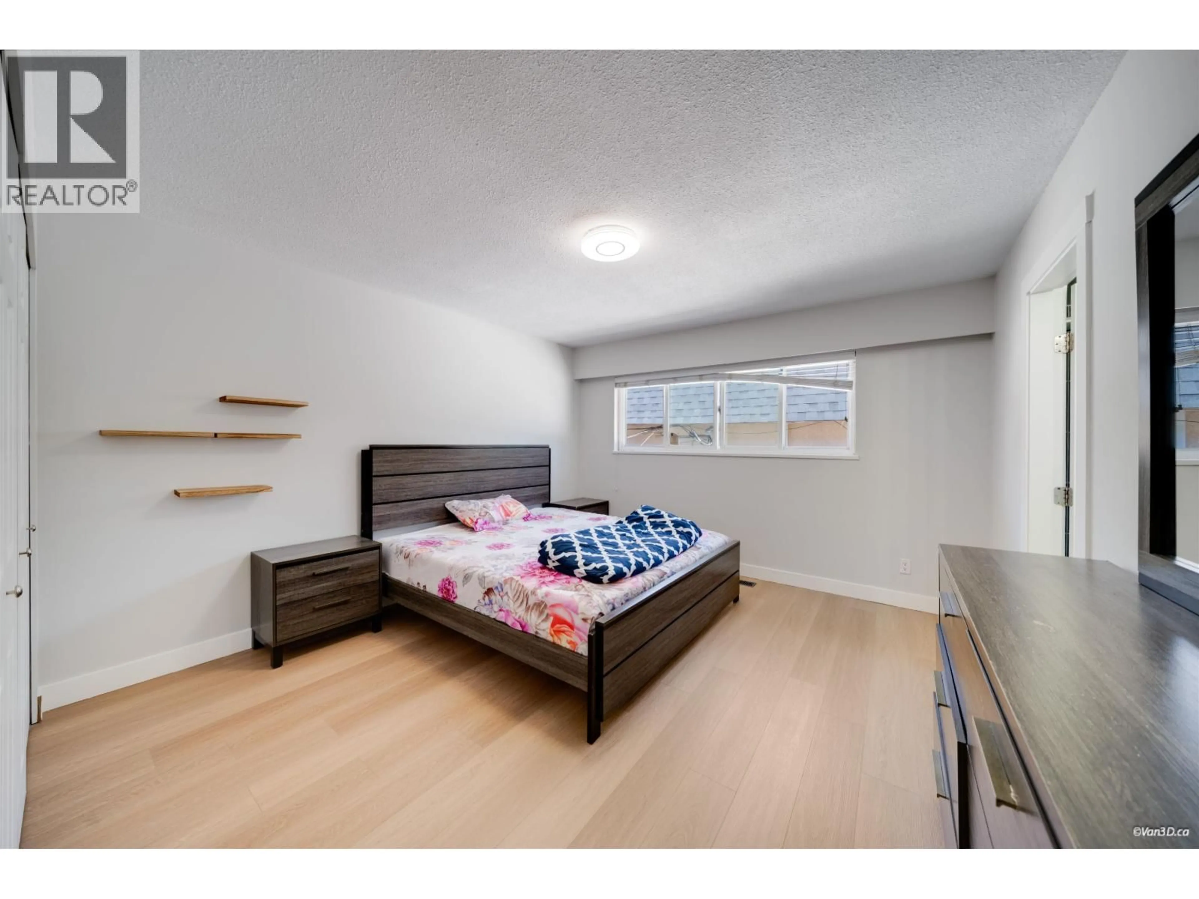 Bedroom with bed, wood/laminate floor for 7148 6TH STREET, Burnaby British Columbia V5E3T5