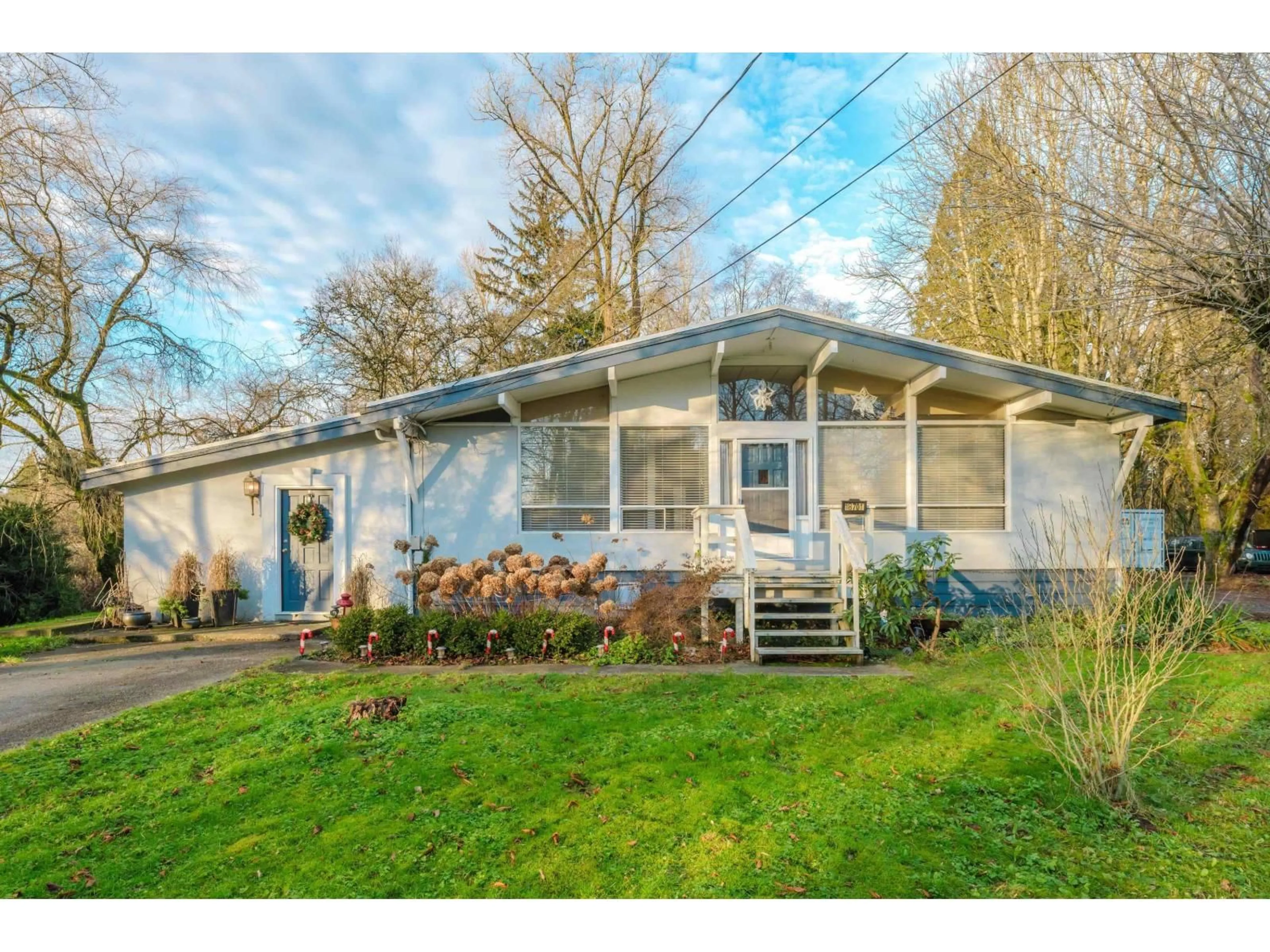 Home with vinyl exterior material, street for 18701 88 AVENUE, Surrey British Columbia V4N5T1
