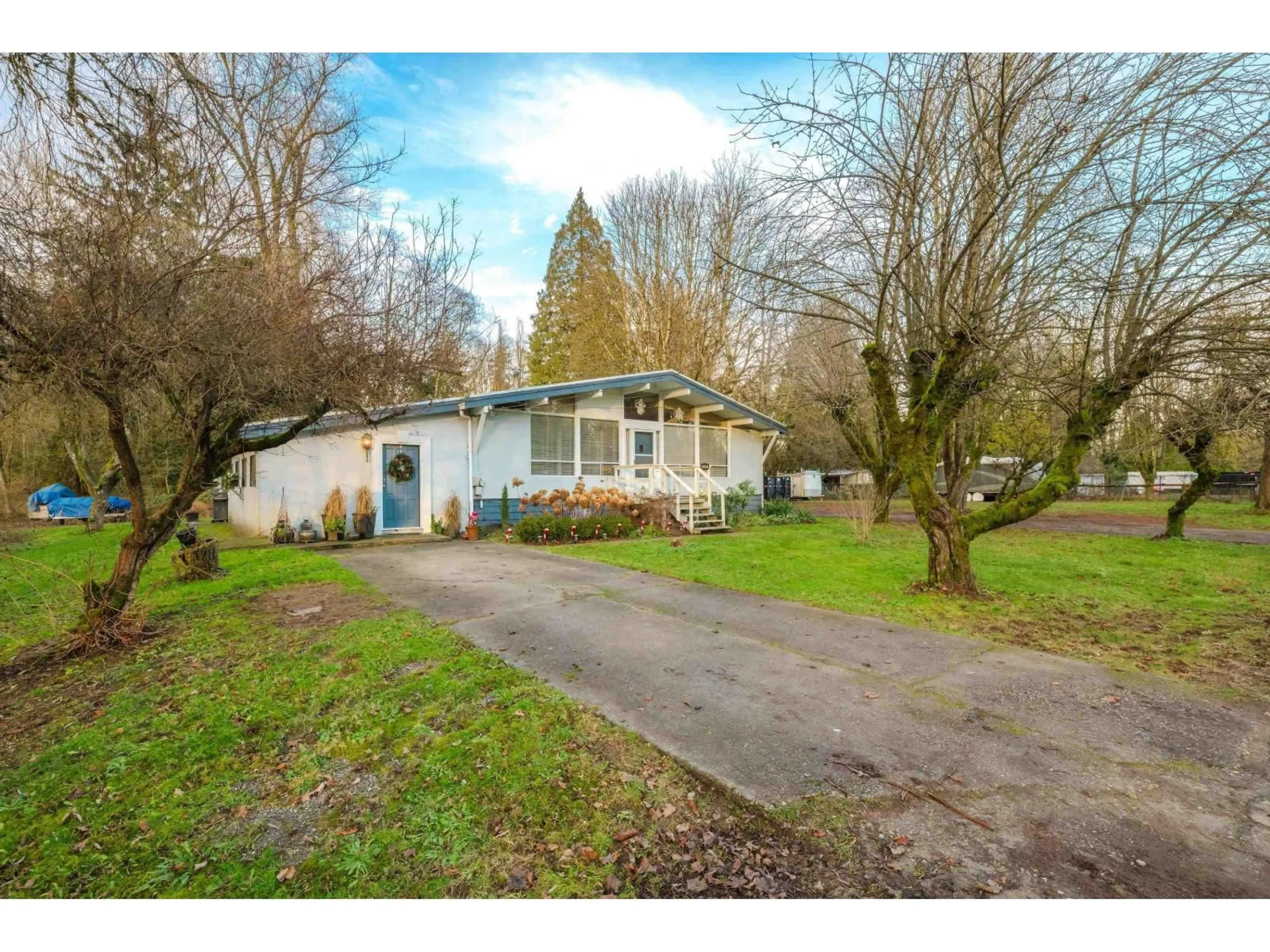 A pic from outside/outdoor area/front of a property/back of a property/a pic from drone, street for 18701 88 AVENUE, Surrey British Columbia V4N5T1