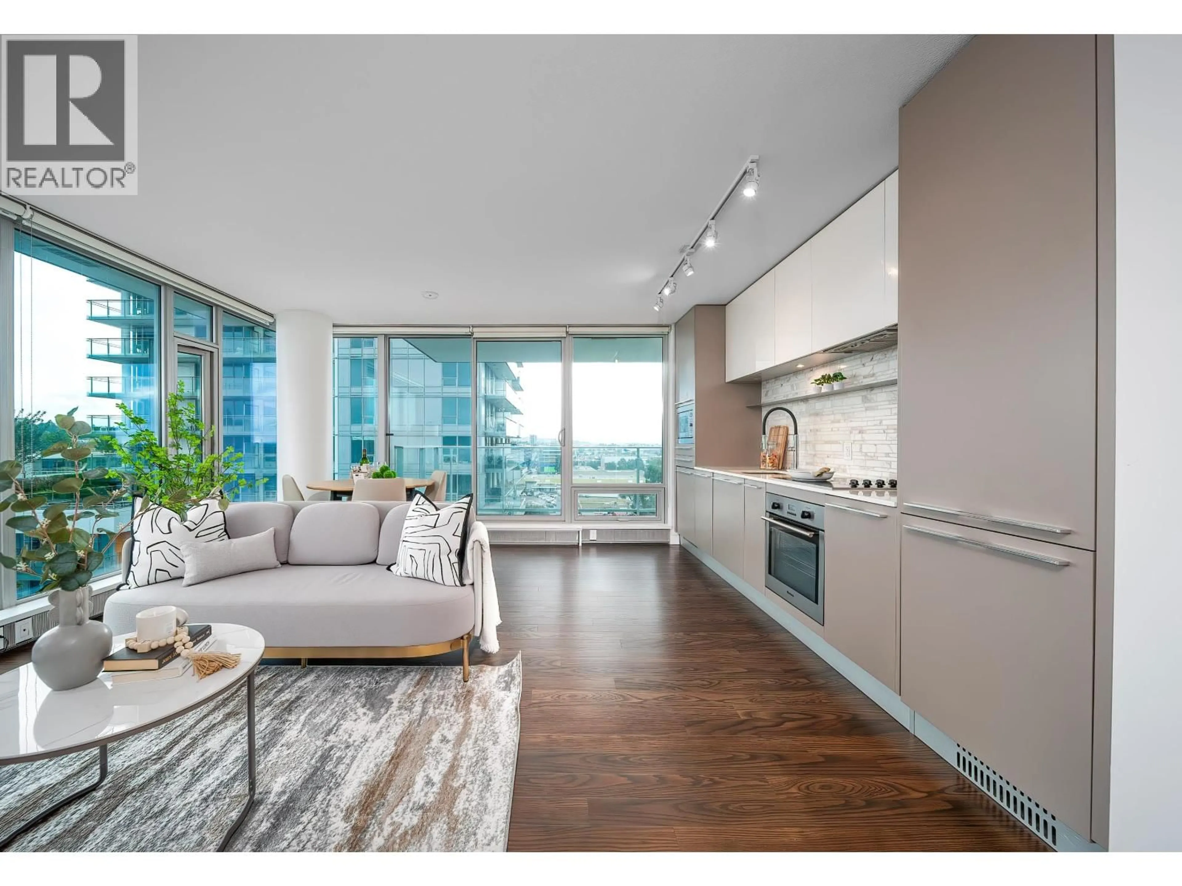 Open concept kitchen, wood/laminate floor for 904 - 8131 NUNAVUT LANE, Vancouver British Columbia V5X0E2