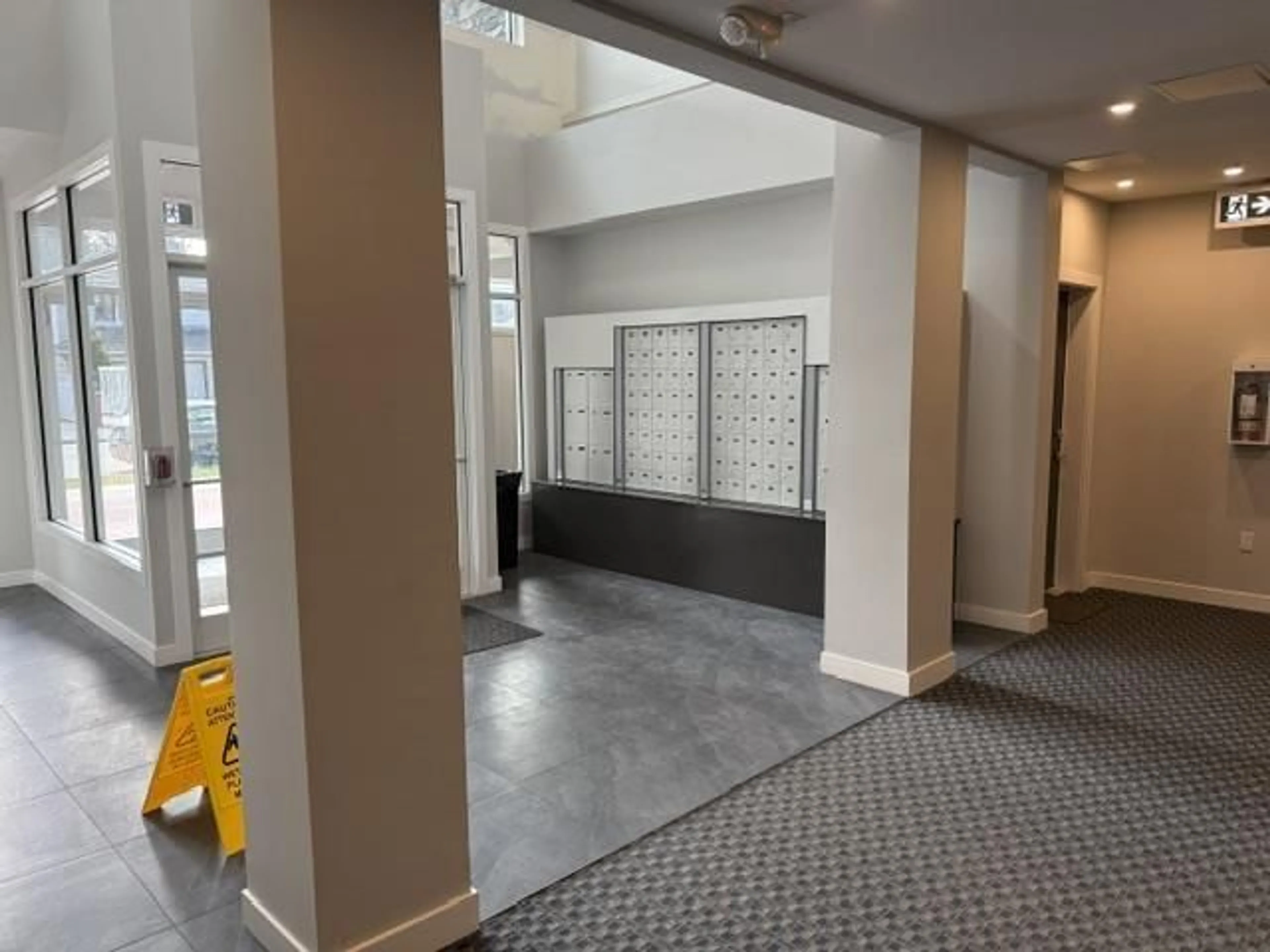 Indoor foyer for 205 - 14225 103A AVENUE, Surrey British Columbia V3T0T4