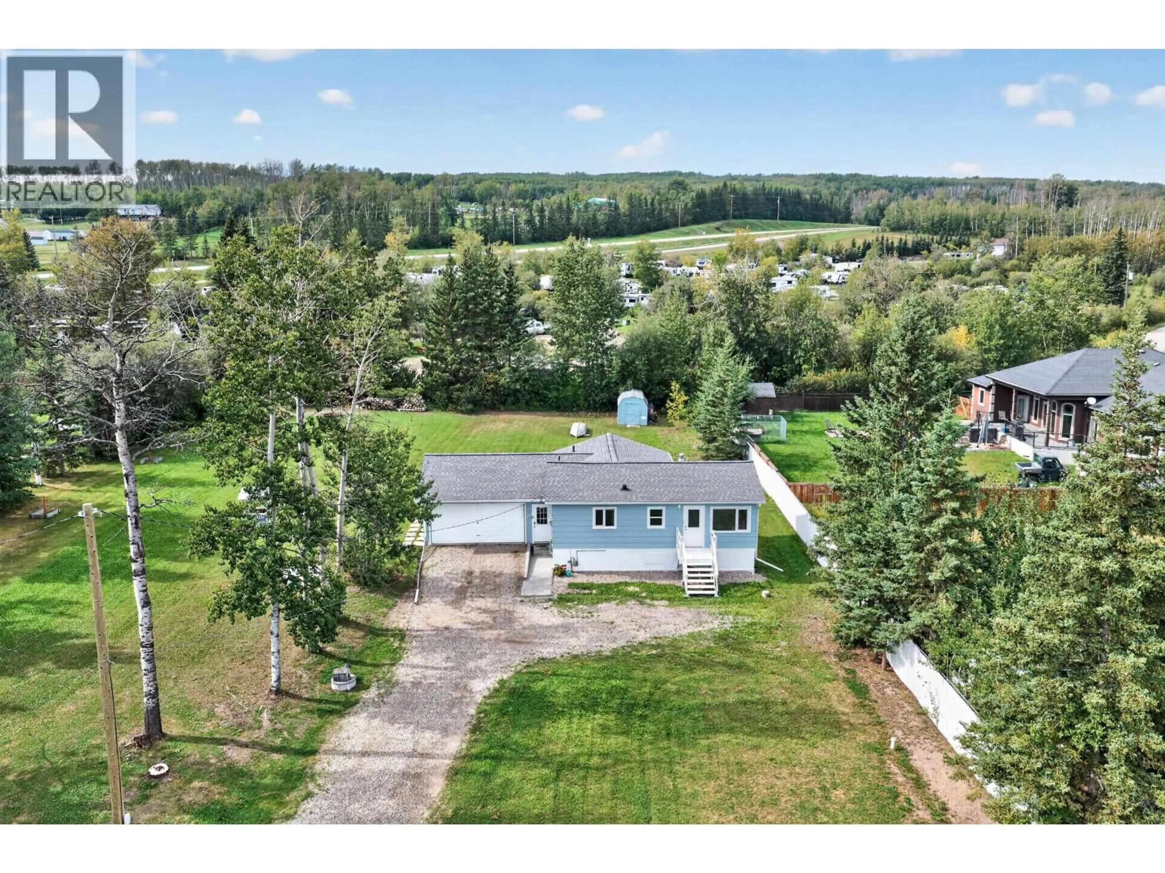 A pic from outside/outdoor area/front of a property/back of a property/a pic from drone, water/lake/river/ocean view for 13119 LAKESHORE DRIVE, Charlie Lake British Columbia V0C1H0