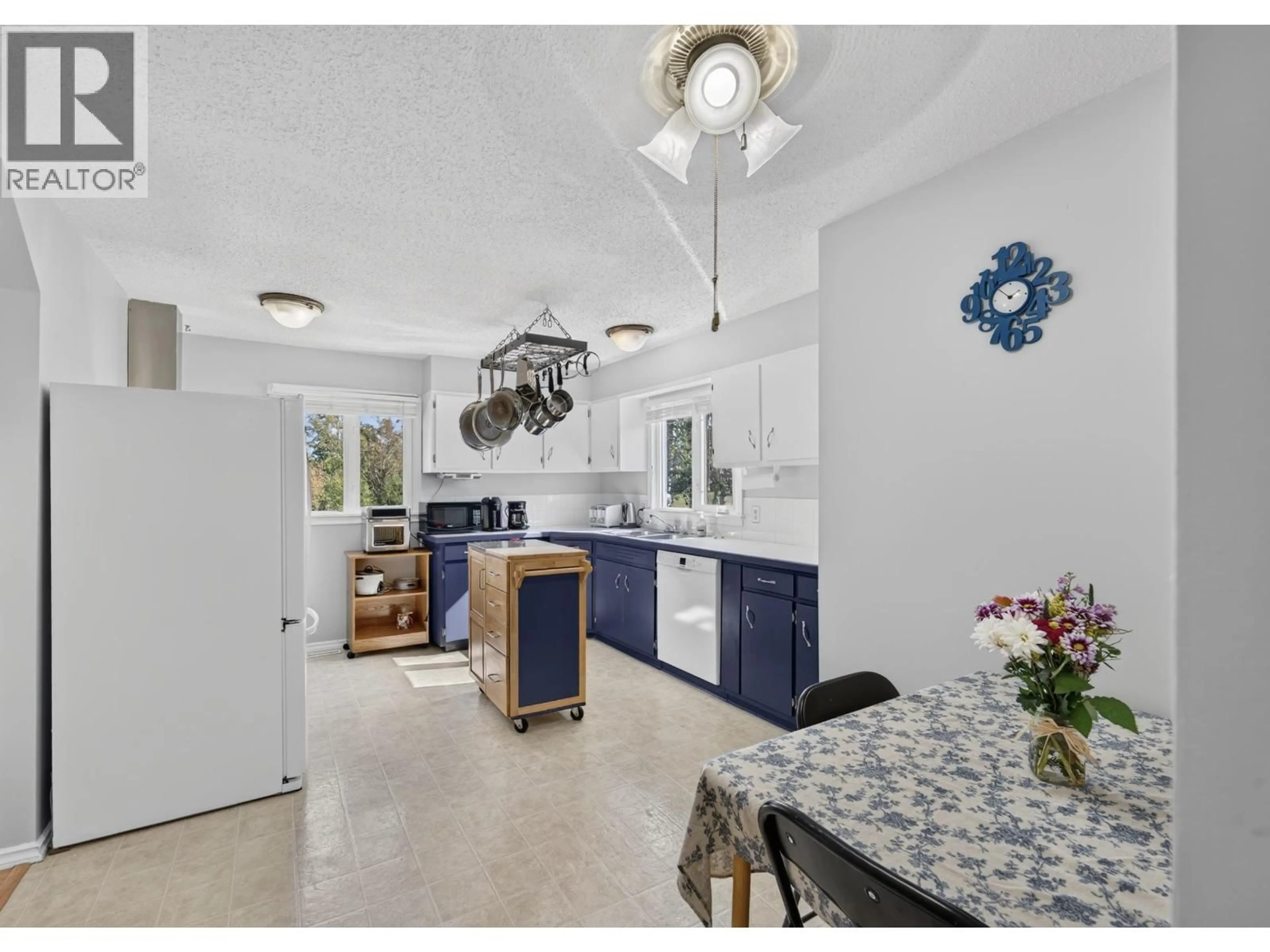 Open concept kitchen, ceramic/tile floor for 13119 LAKESHORE DRIVE, Charlie Lake British Columbia V0C1H0