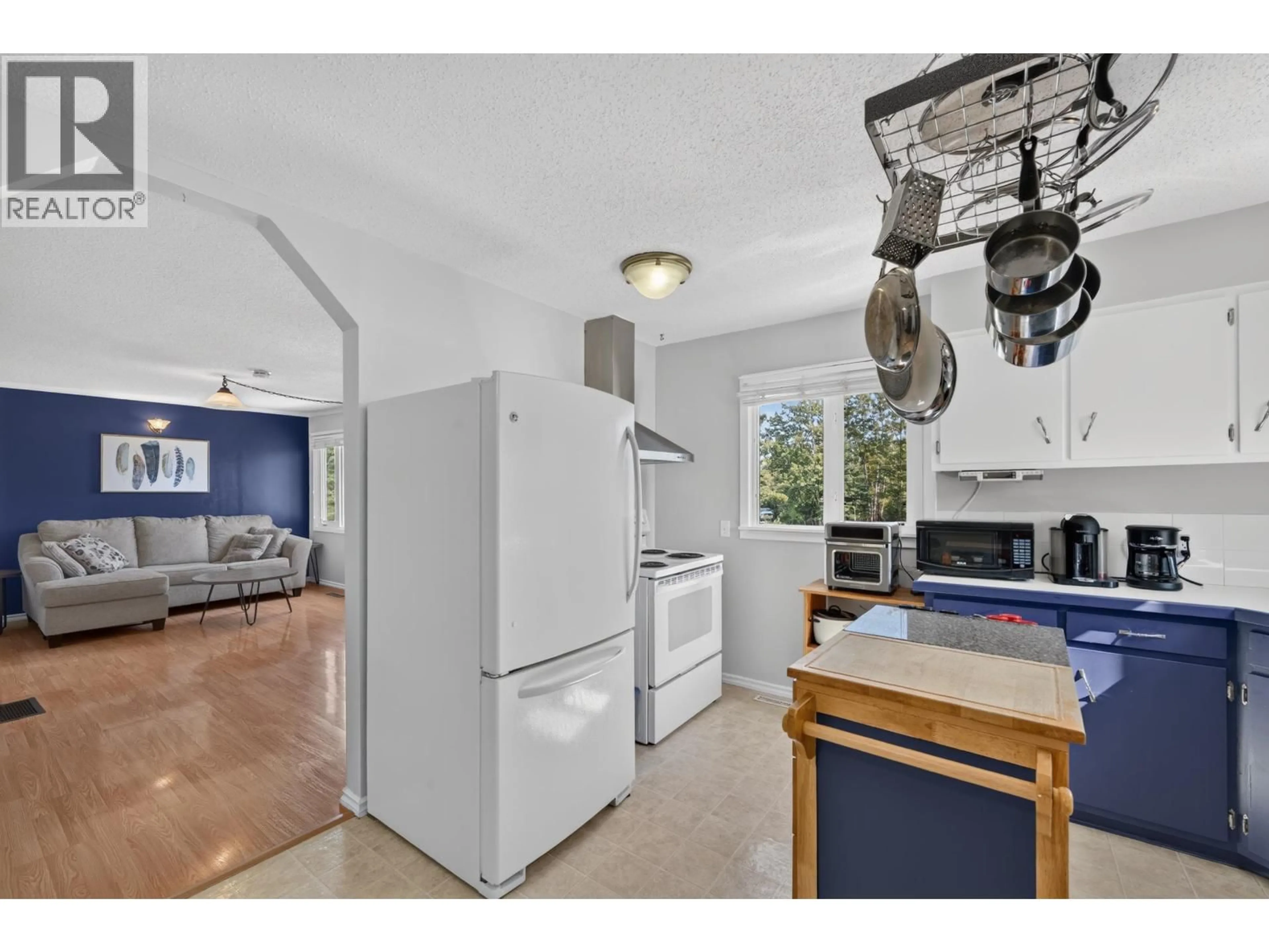 Open concept kitchen, ceramic/tile floor for 13119 LAKESHORE DRIVE, Charlie Lake British Columbia V0C1H0