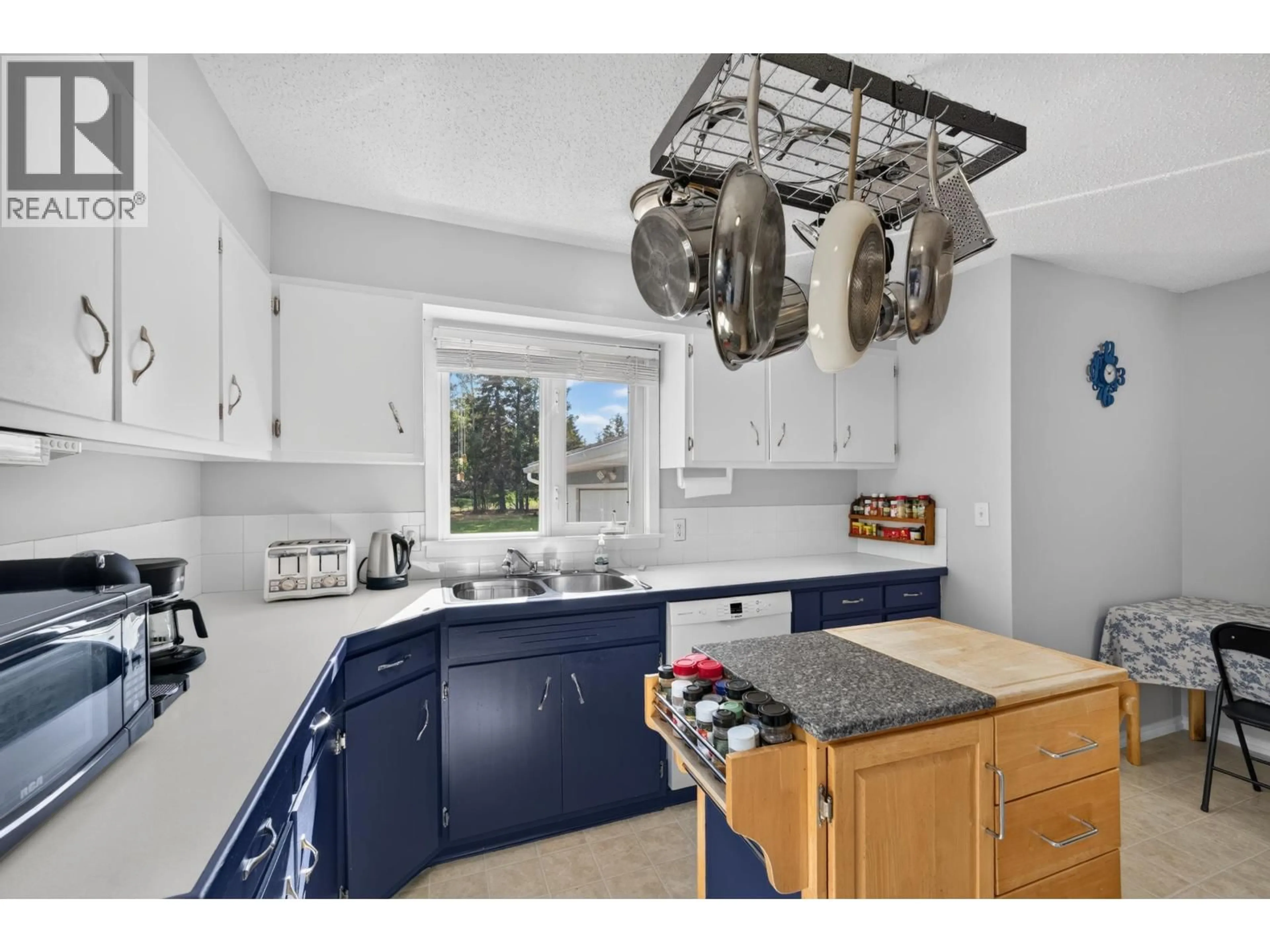 Standard kitchen, ceramic/tile floor for 13119 LAKESHORE DRIVE, Charlie Lake British Columbia V0C1H0