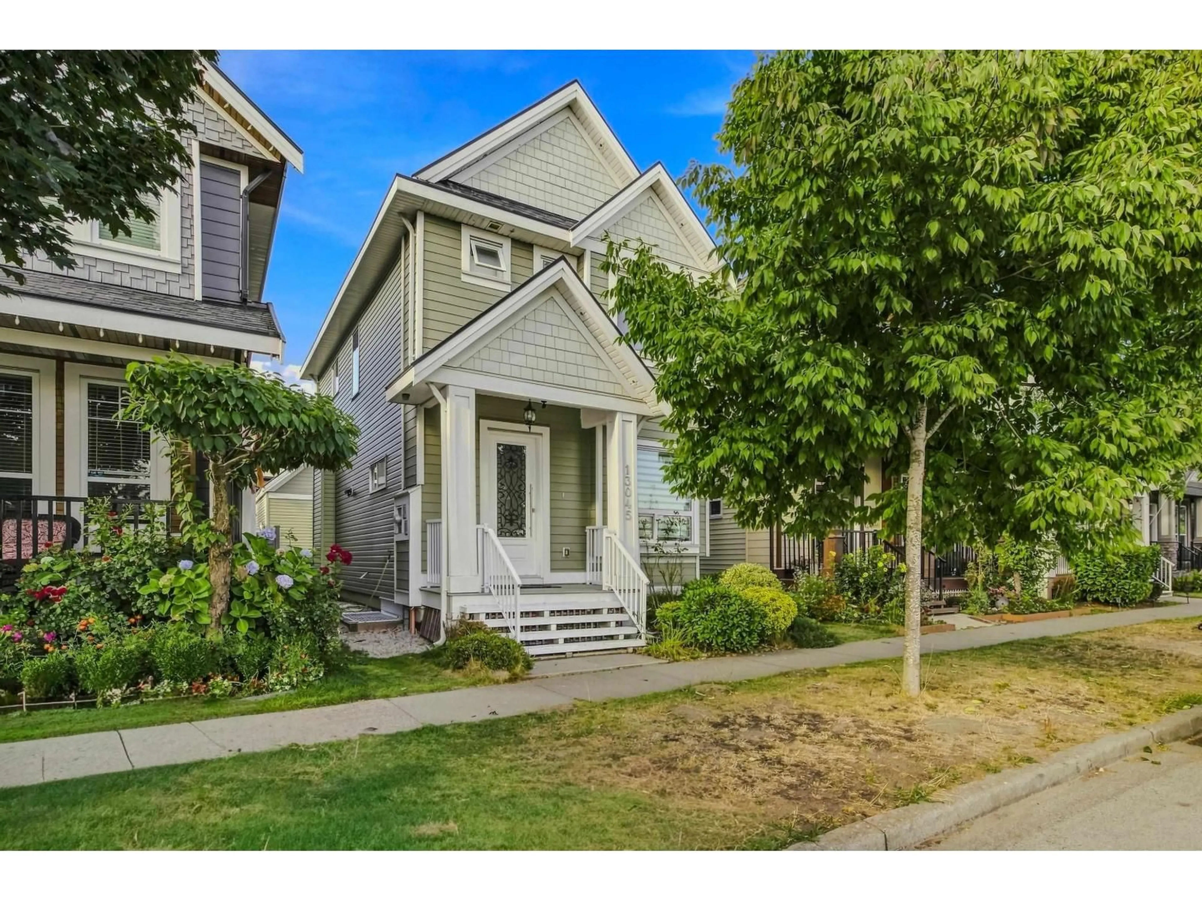 Home with vinyl exterior material, street for 13045 59 AVENUE, Surrey British Columbia V3X0G5