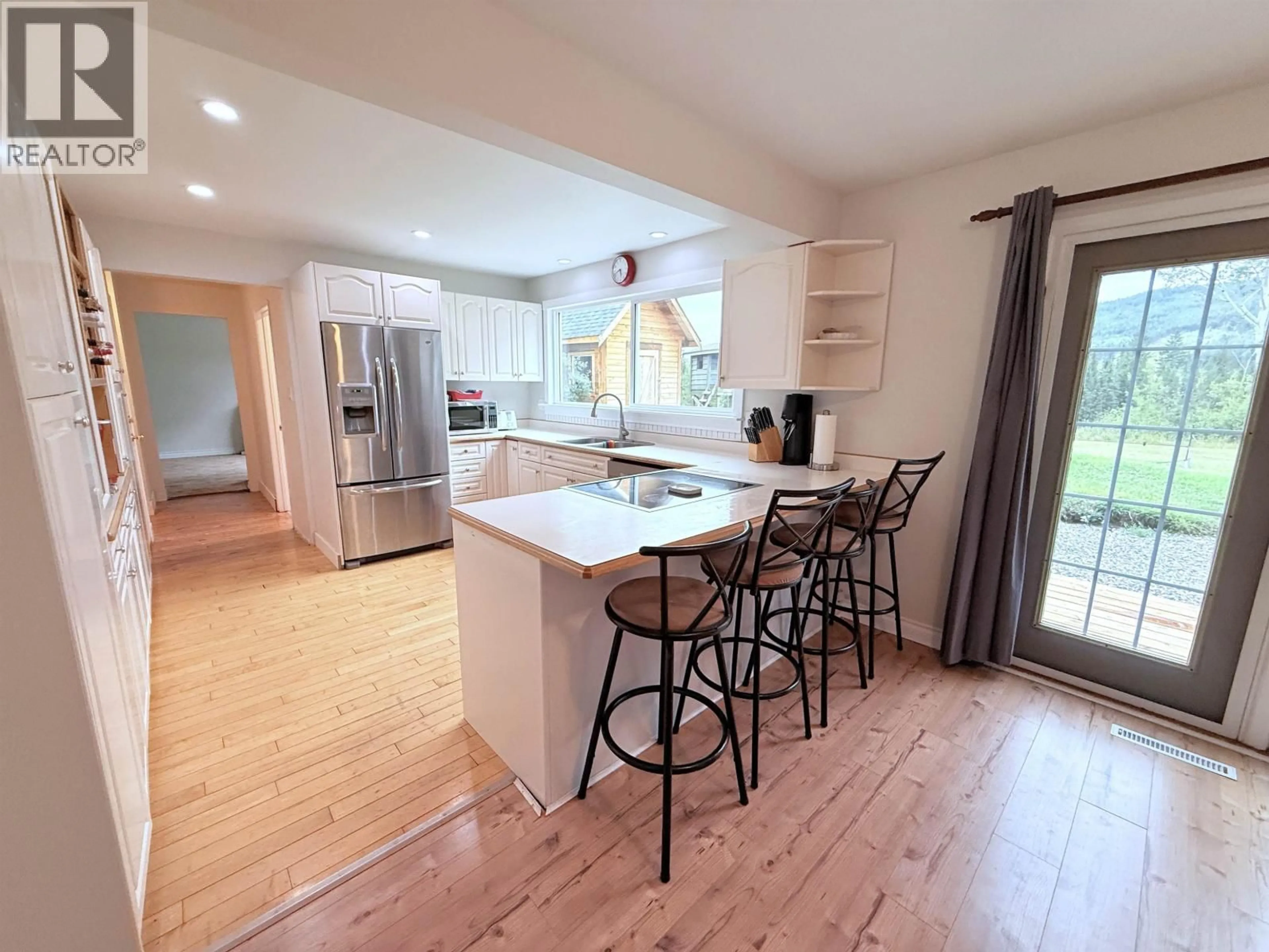 Open concept kitchen, unknown for 255 EVERGREEN CRESCENT, 100 Mile House British Columbia V0K2E0
