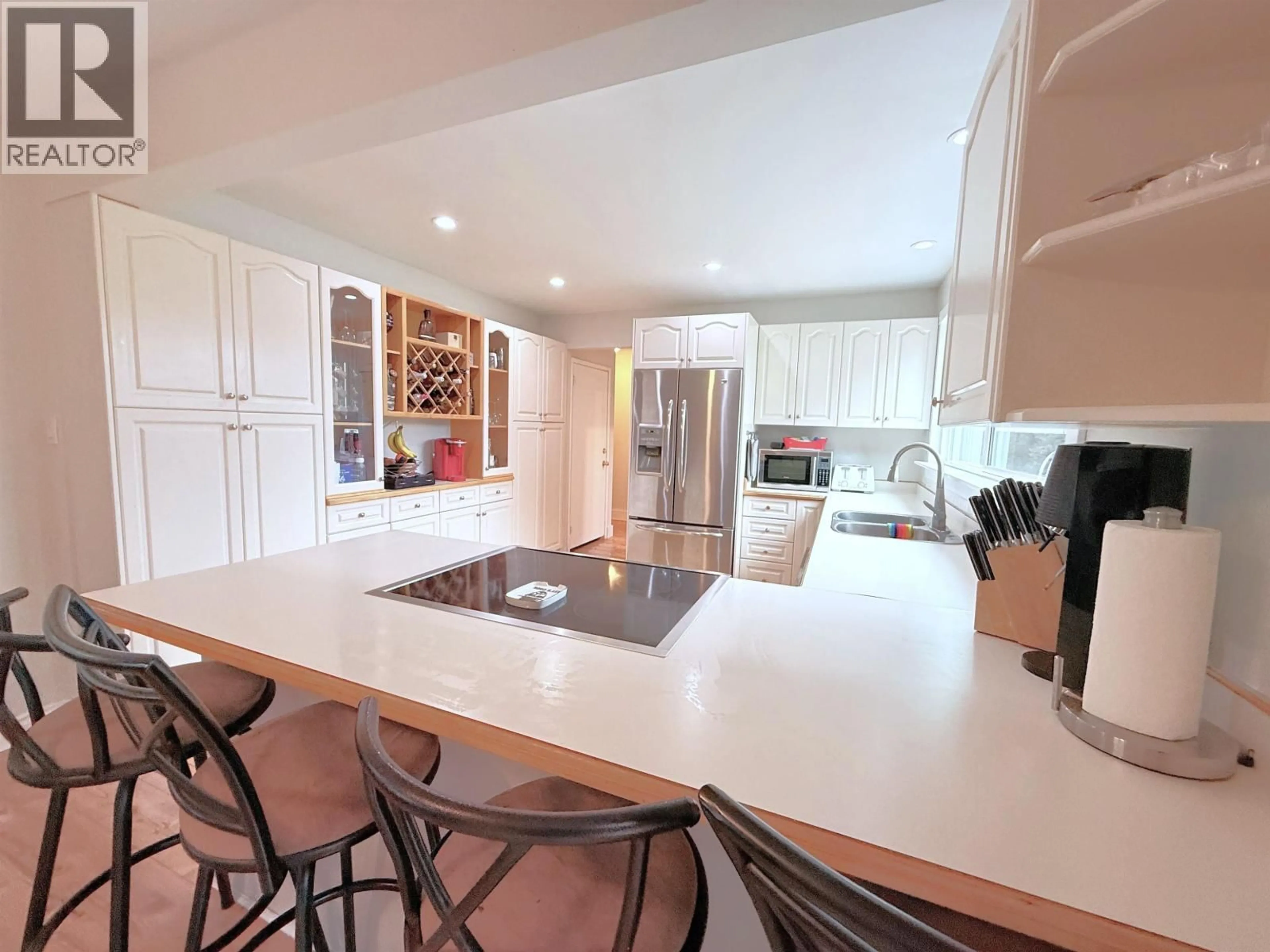 Contemporary kitchen, ceramic/tile floor for 255 EVERGREEN CRESCENT, 100 Mile House British Columbia V0K2E0
