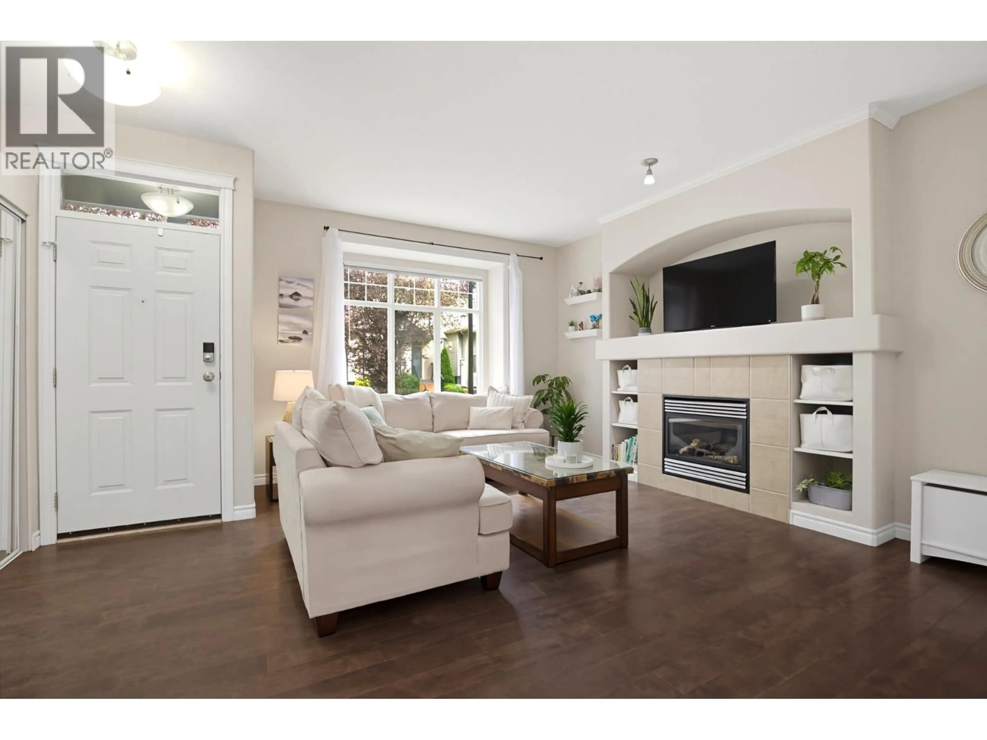 Living room with furniture, wood/laminate floor for 24360 102A AVENUE, Maple Ridge British Columbia V2W2E3