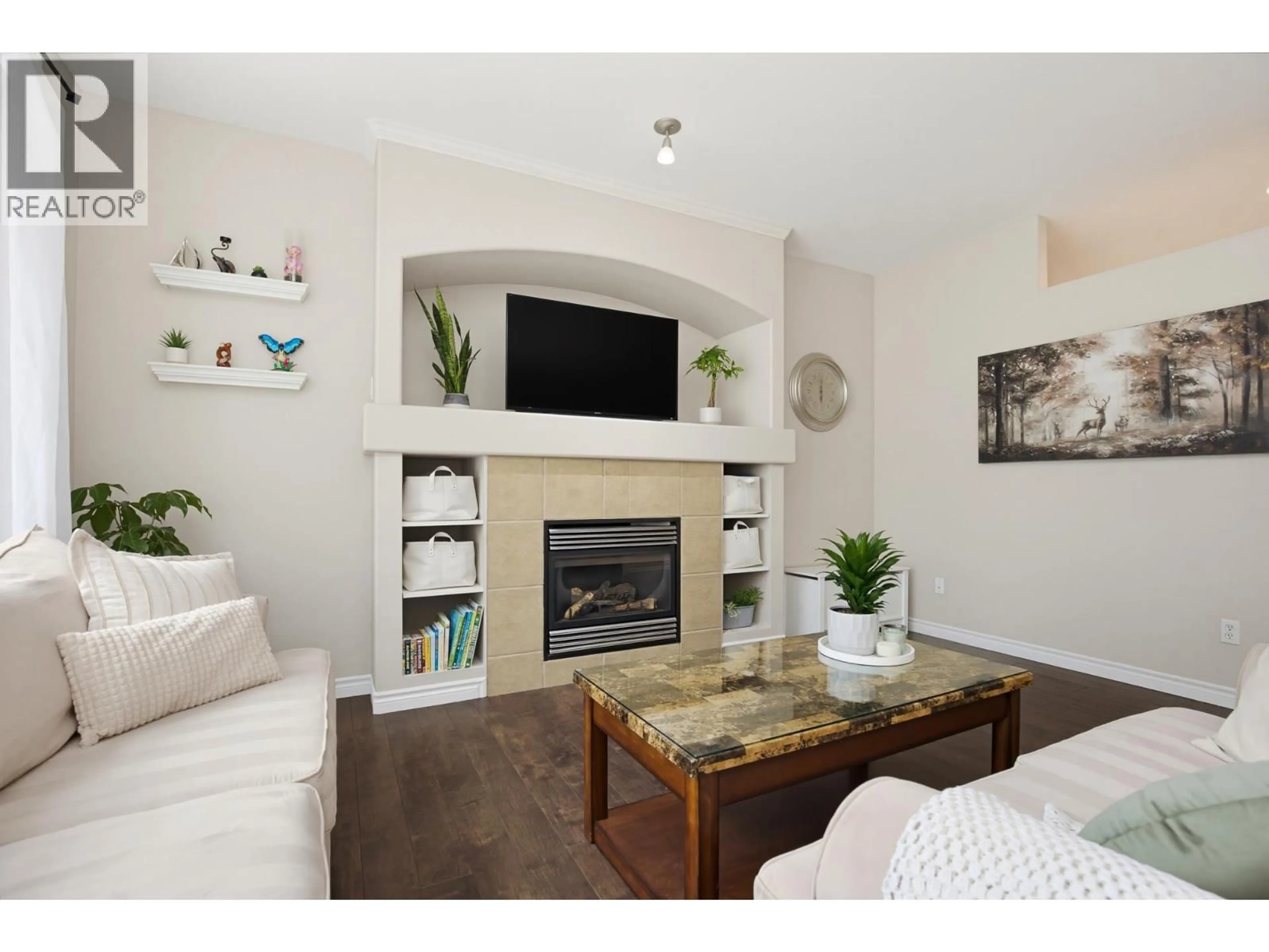 Living room with furniture, wood/laminate floor for 24360 102A AVENUE, Maple Ridge British Columbia V2W2E3