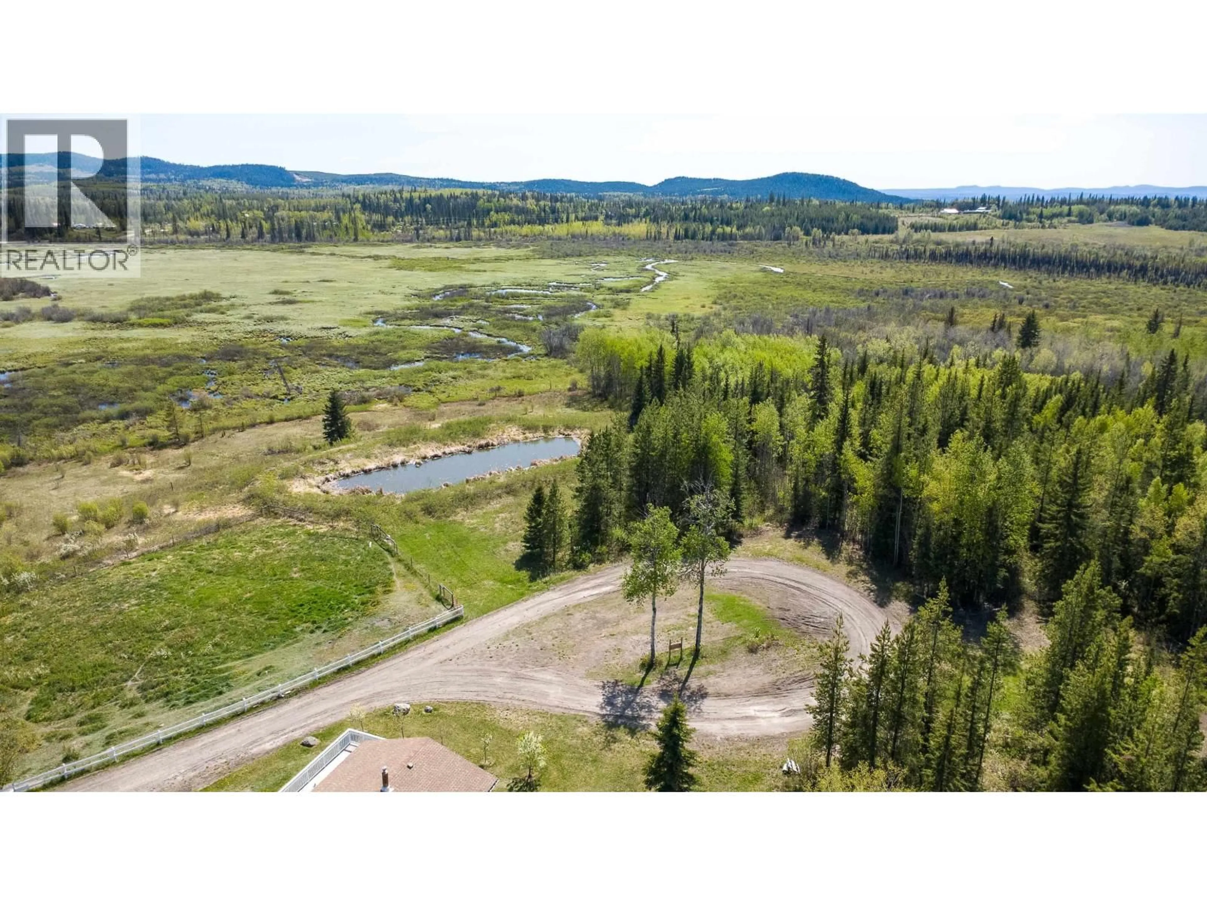 A pic from outside/outdoor area/front of a property/back of a property/a pic from drone, unknown for 1000 TACHIE ROAD, Fort St. James British Columbia V0J1P0