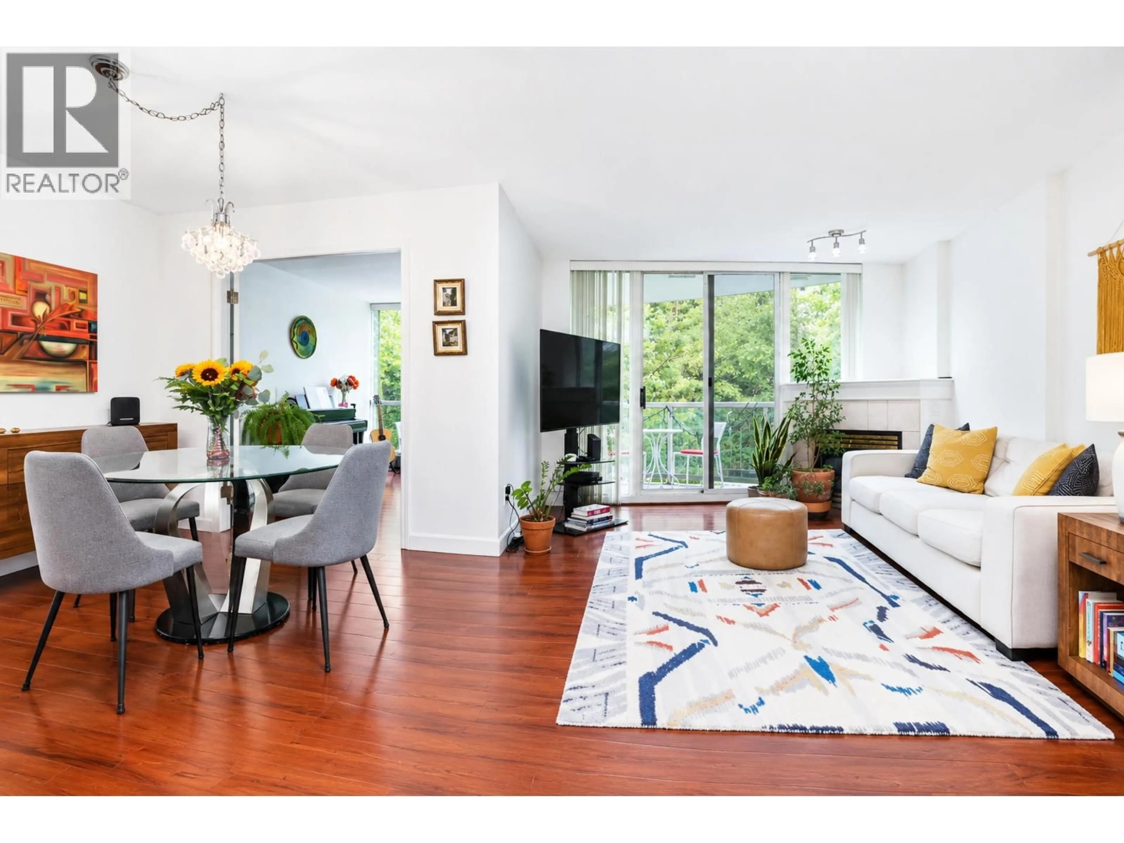 Living room with furniture, wood/laminate floor for 303 - 200 NEWPORT DRIVE, Port Moody British Columbia V3H5B7