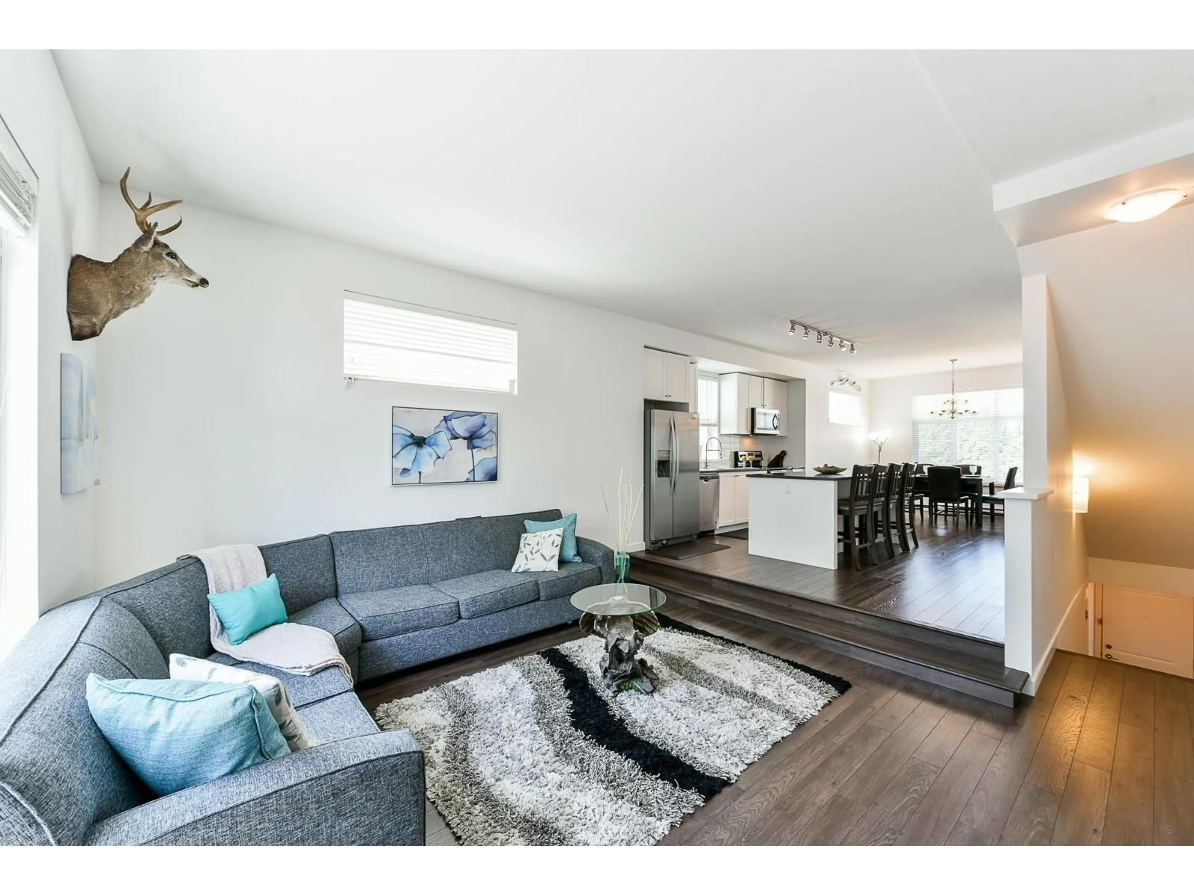 Living room with furniture, wood/laminate floor for 51 - 8130 136A STREET, Surrey British Columbia V3W1H9