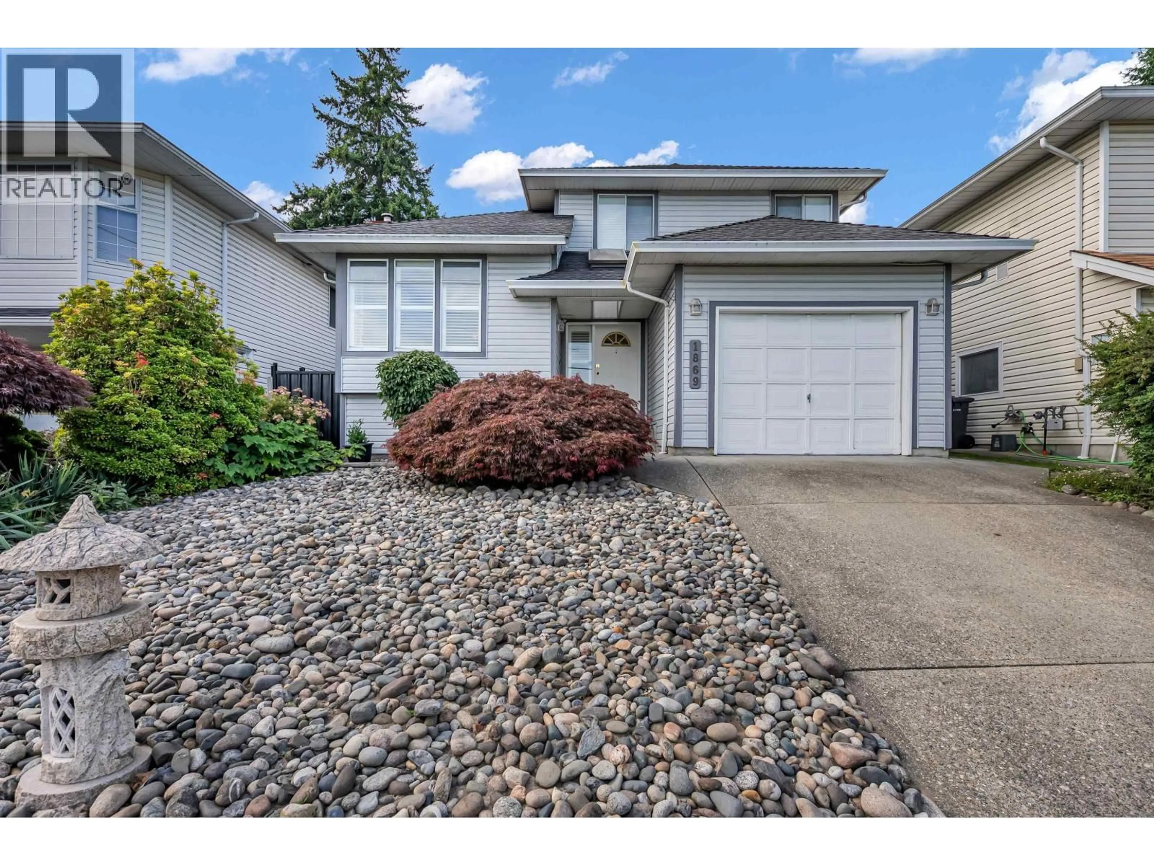 Home with vinyl exterior material, street for 1869 HARBOUR STREET, Port Coquitlam British Columbia V3C1A4