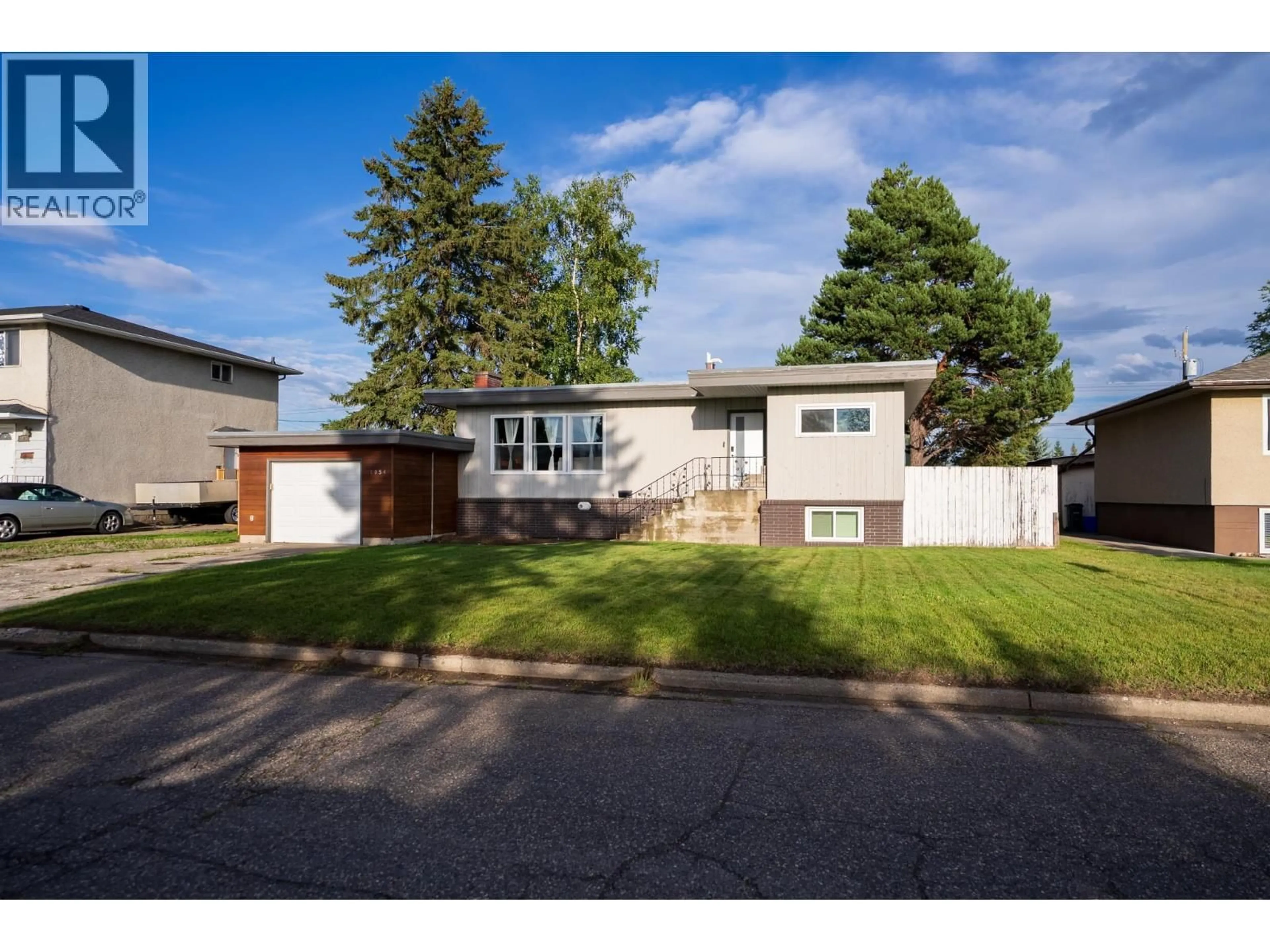 Home with vinyl exterior material, street for 1054 HARPER STREET, Prince George British Columbia V2M2W9