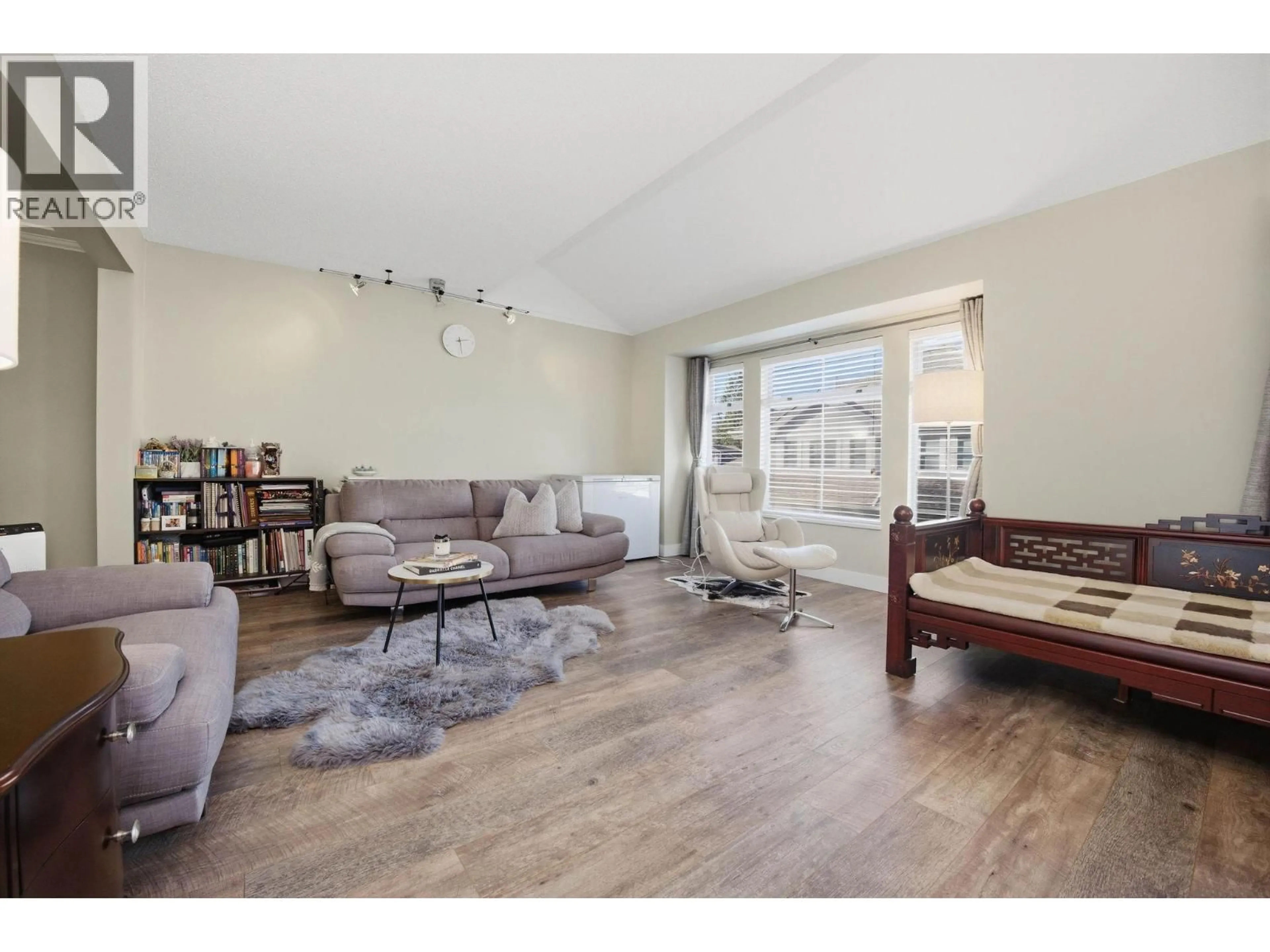 Living room with furniture, wood/laminate floor for 817 ROCHE POINT DRIVE, North Vancouver British Columbia V7H2W3