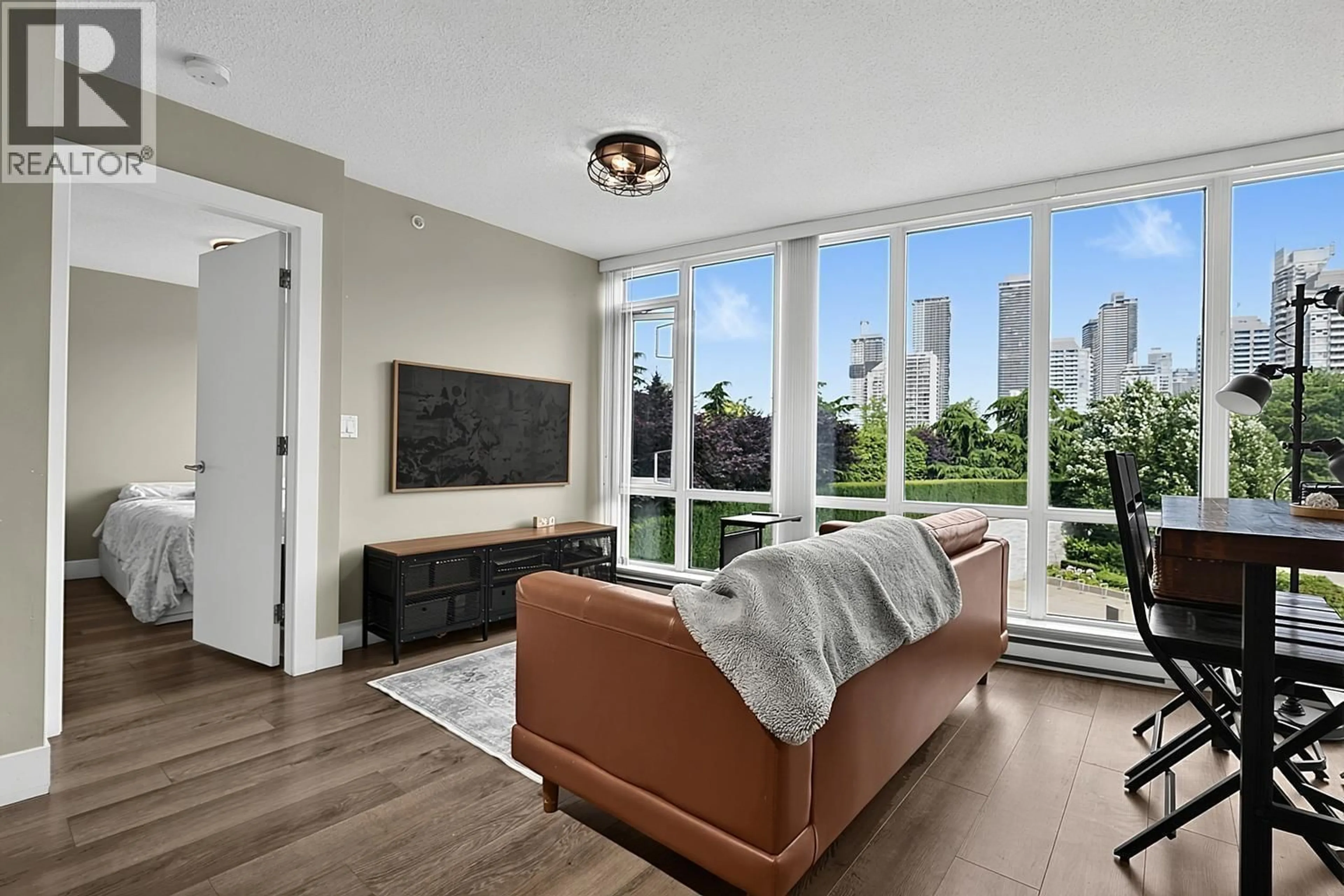 Living room with furniture, unknown for 308 - 4189 HALIFAX STREET, Burnaby British Columbia V5C0H9