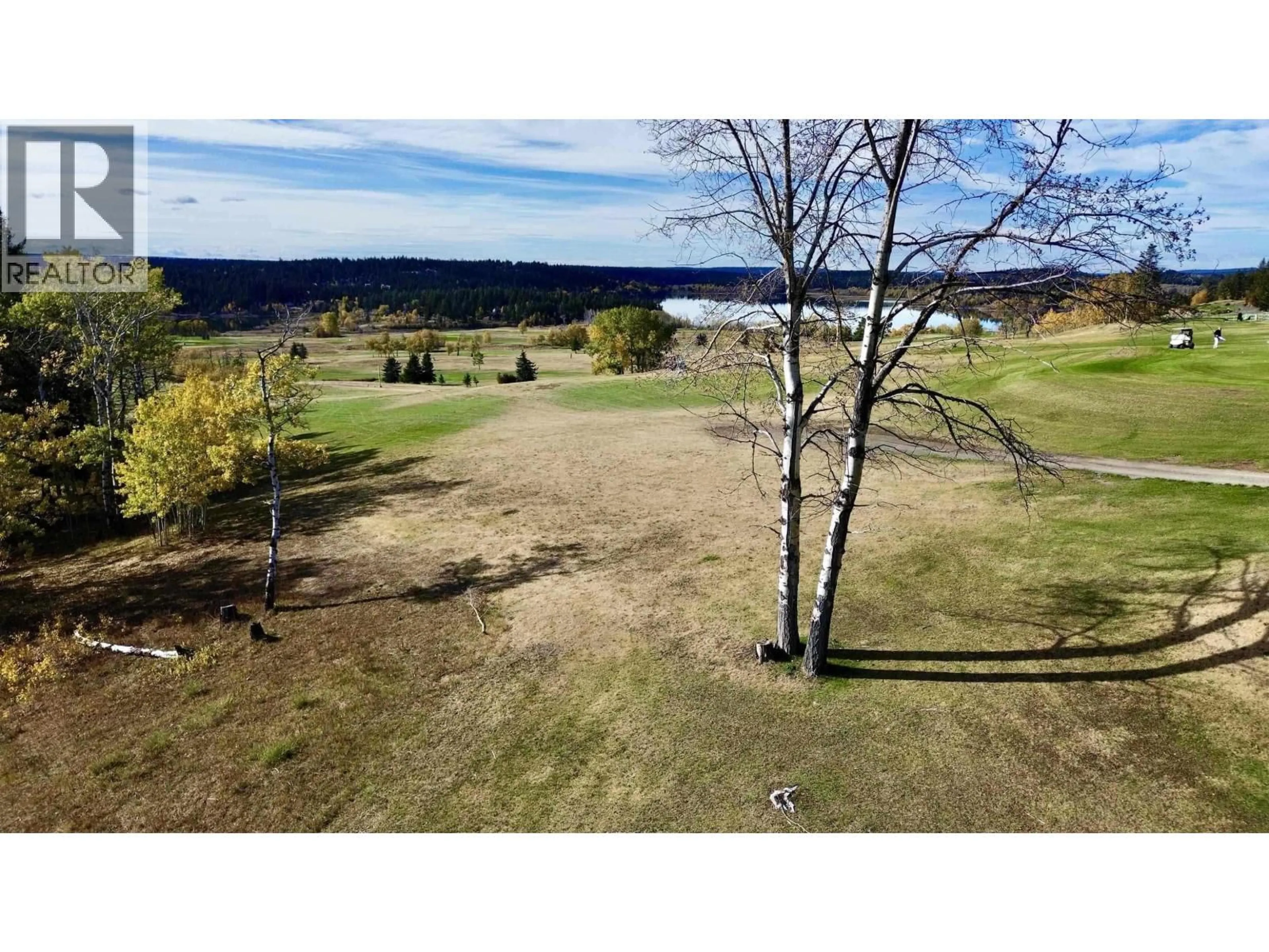 A pic from outside/outdoor area/front of a property/back of a property/a pic from drone, water/lake/river/ocean view for 4838 TELQUA DRIVE, 108 Mile Ranch British Columbia V0K2Z0