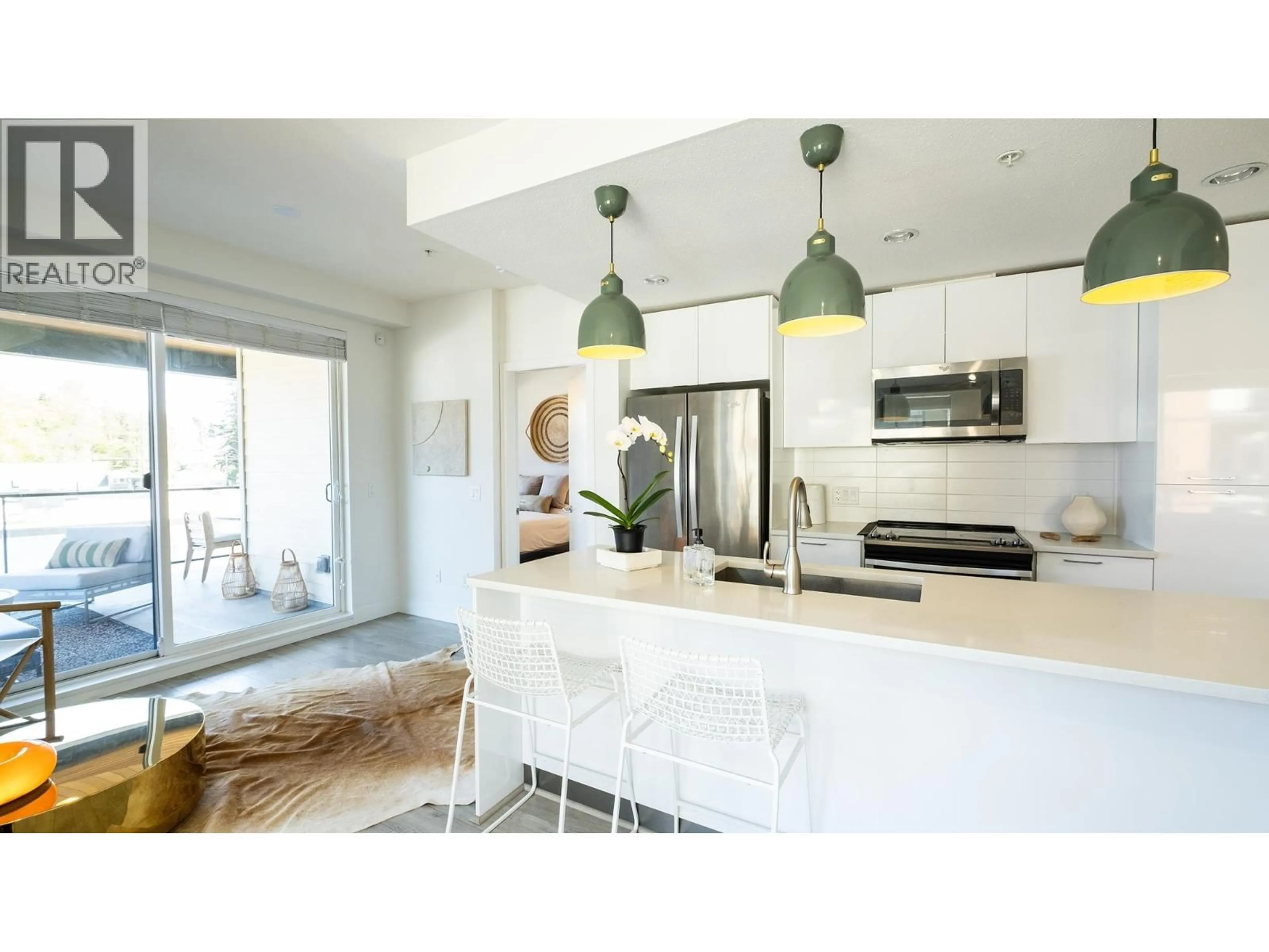 Open concept kitchen, unknown for 409 - 719 3RD STREET, North Vancouver British Columbia V7M0E7