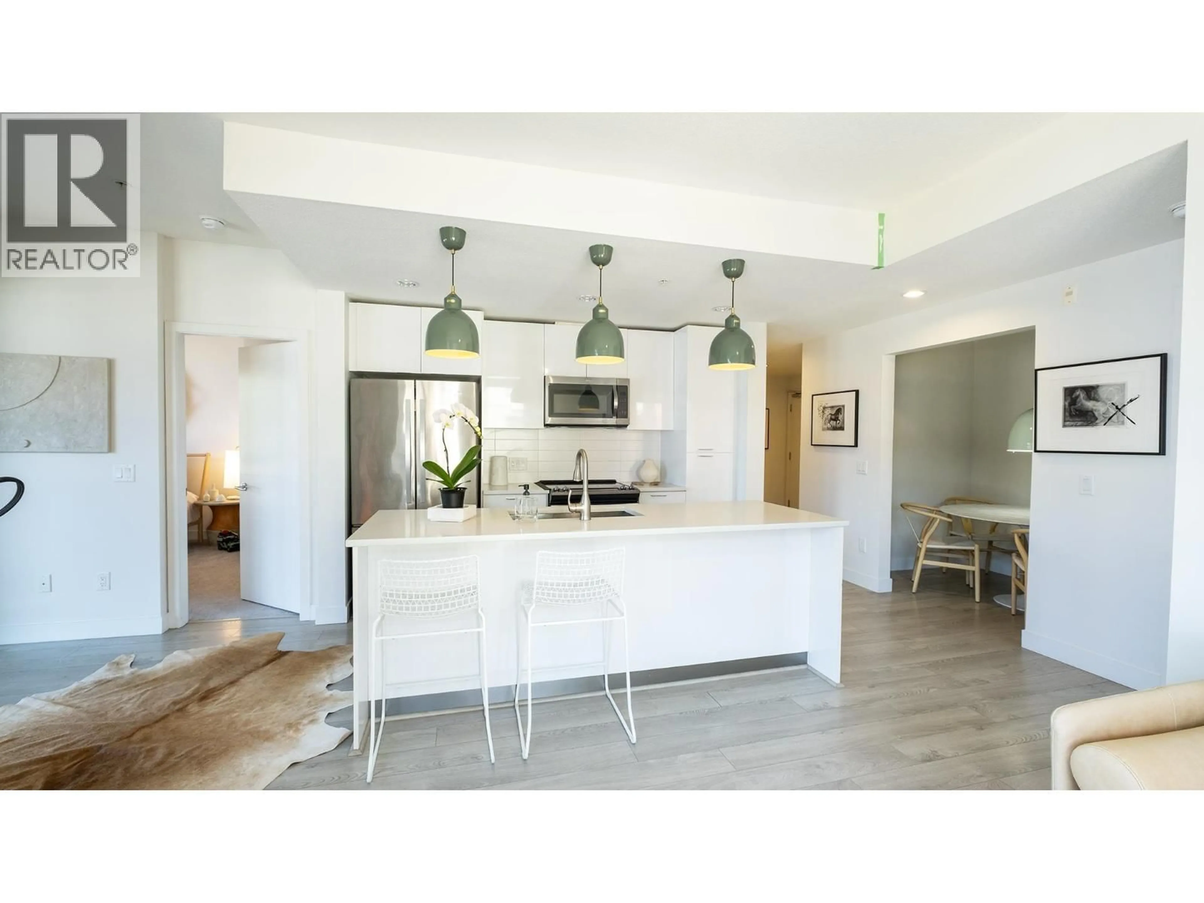 Open concept kitchen, unknown for 409 - 719 3RD STREET, North Vancouver British Columbia V7M0E7