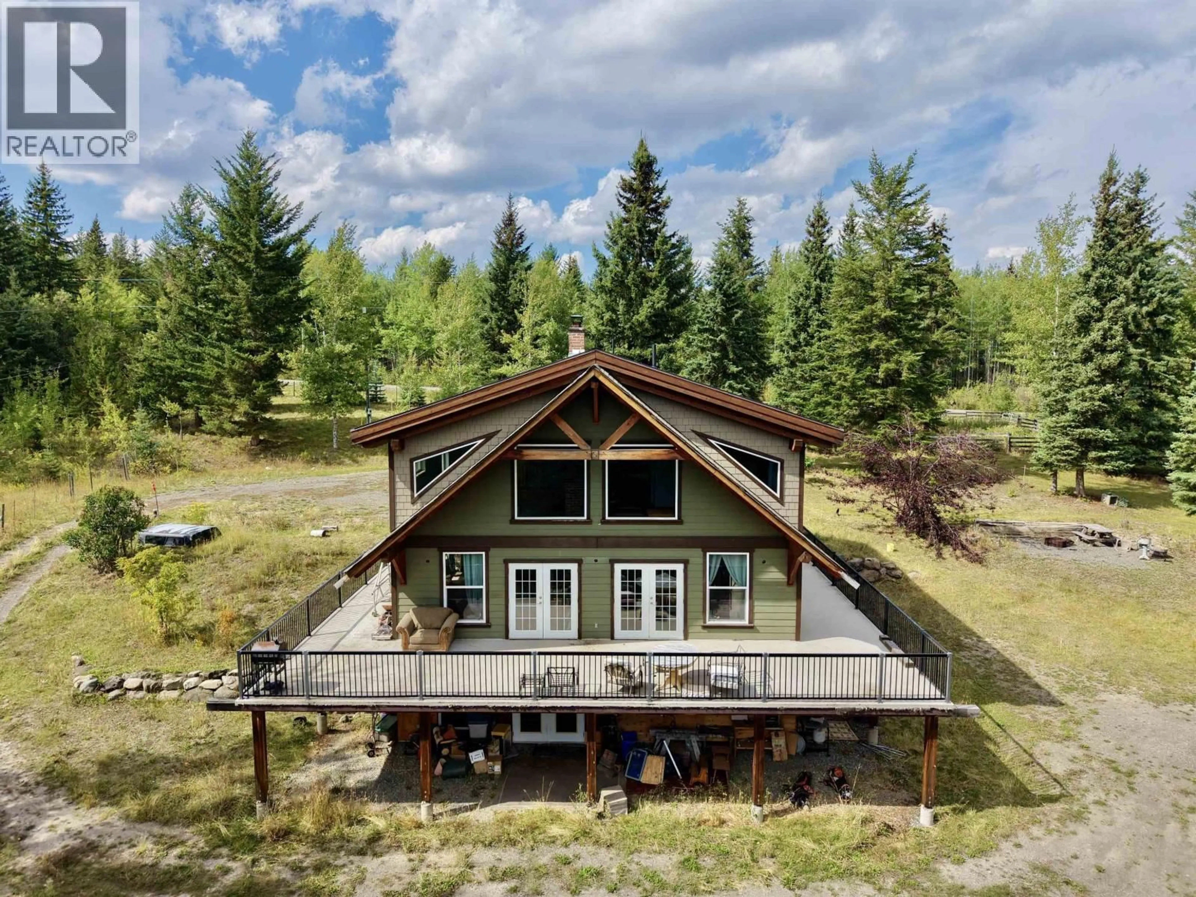 A pic from outside/outdoor area/front of a property/back of a property/a pic from drone, water/lake/river/ocean view for 6995 COLGAN ROAD, 100 Mile House British Columbia V0K1X1