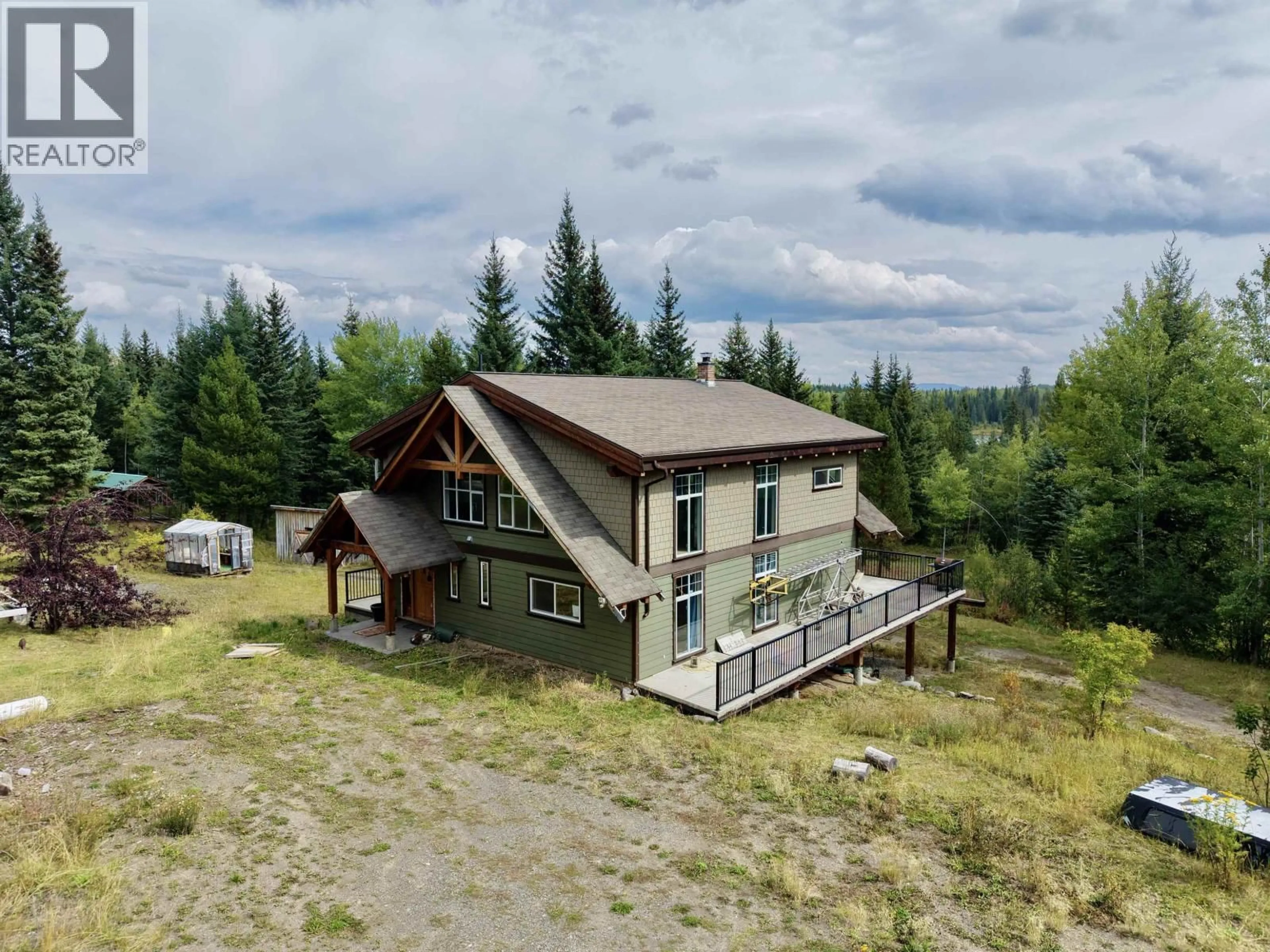 A pic from outside/outdoor area/front of a property/back of a property/a pic from drone, mountain view for 6995 COLGAN ROAD, 100 Mile House British Columbia V0K1X1