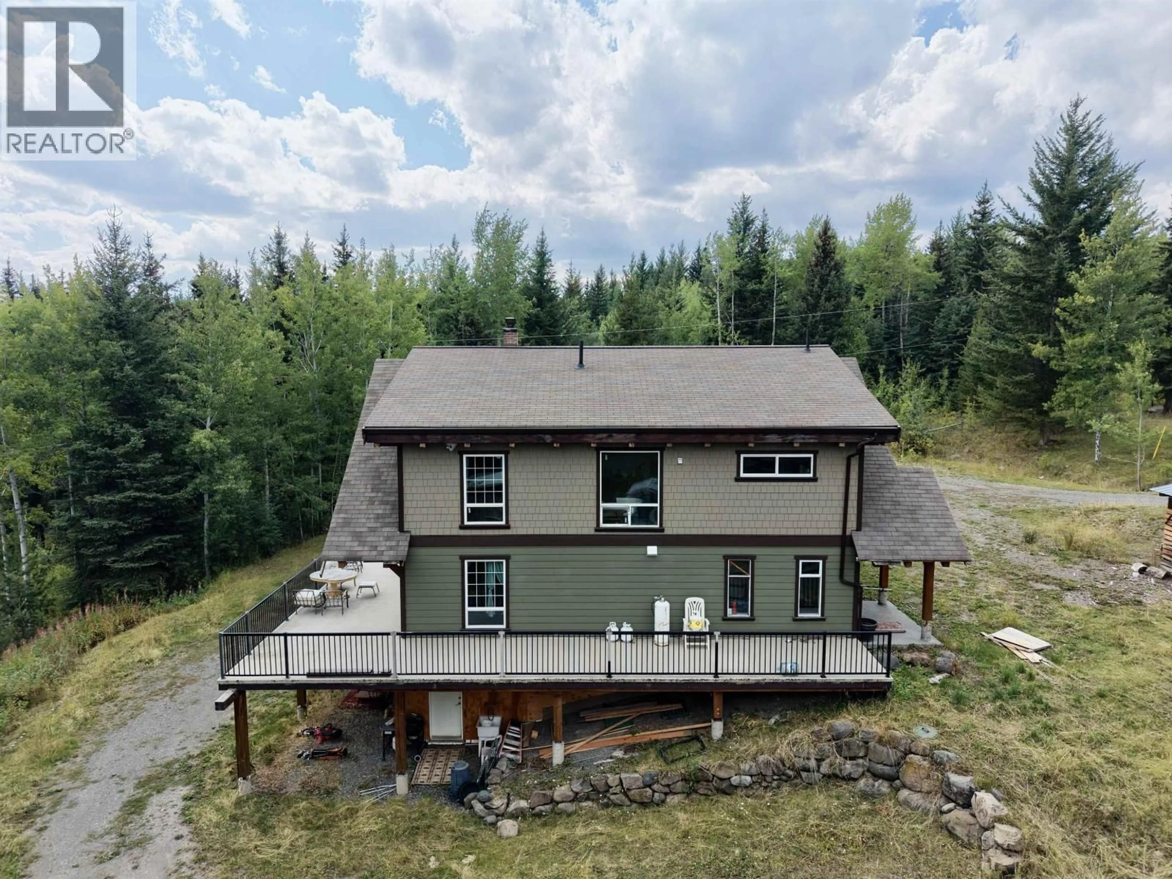 A pic from outside/outdoor area/front of a property/back of a property/a pic from drone, unknown for 6995 COLGAN ROAD, 100 Mile House British Columbia V0K1X1
