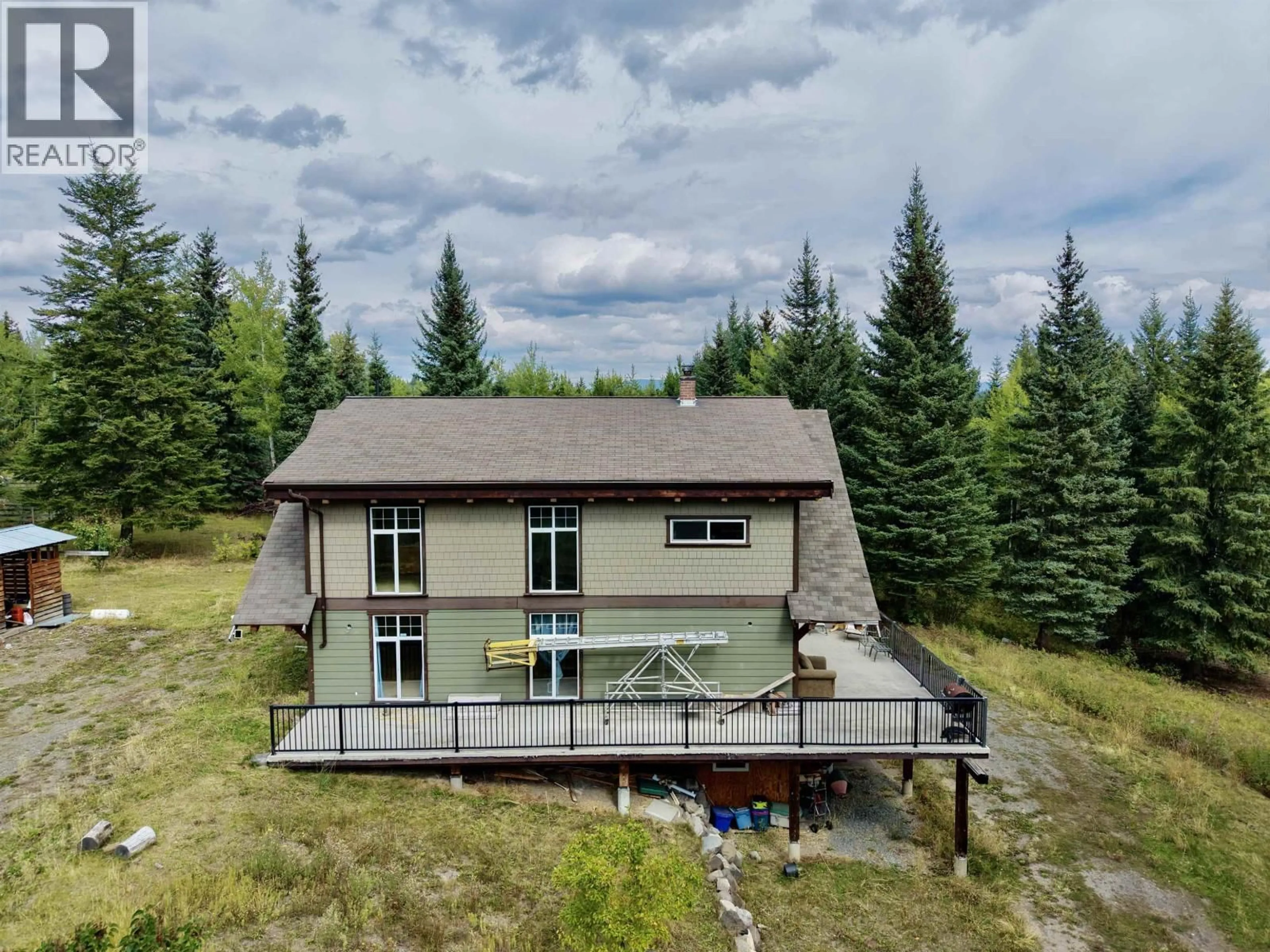 A pic from outside/outdoor area/front of a property/back of a property/a pic from drone, unknown for 6995 COLGAN ROAD, 100 Mile House British Columbia V0K1X1