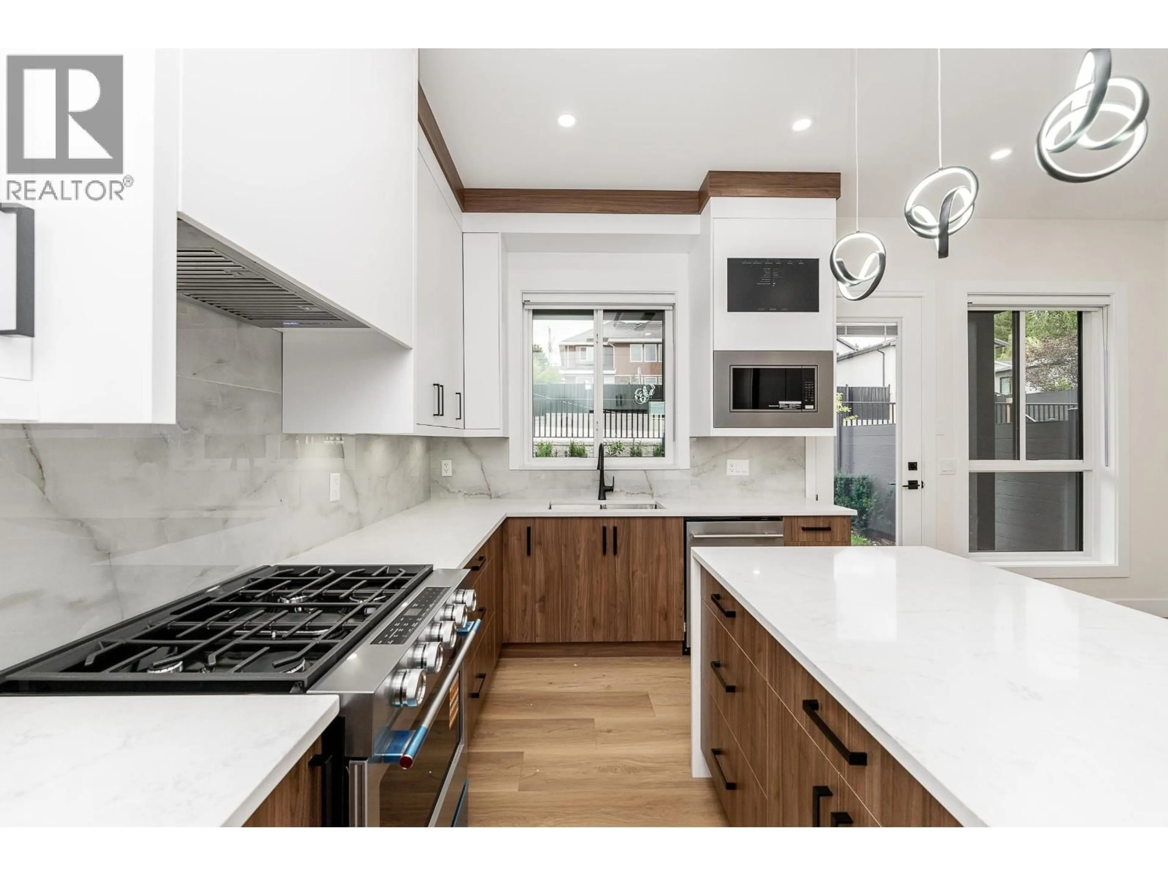 Contemporary kitchen, ceramic/tile floor for 101 - 1149 DANSEY AVENUE, Coquitlam British Columbia V3K3H5