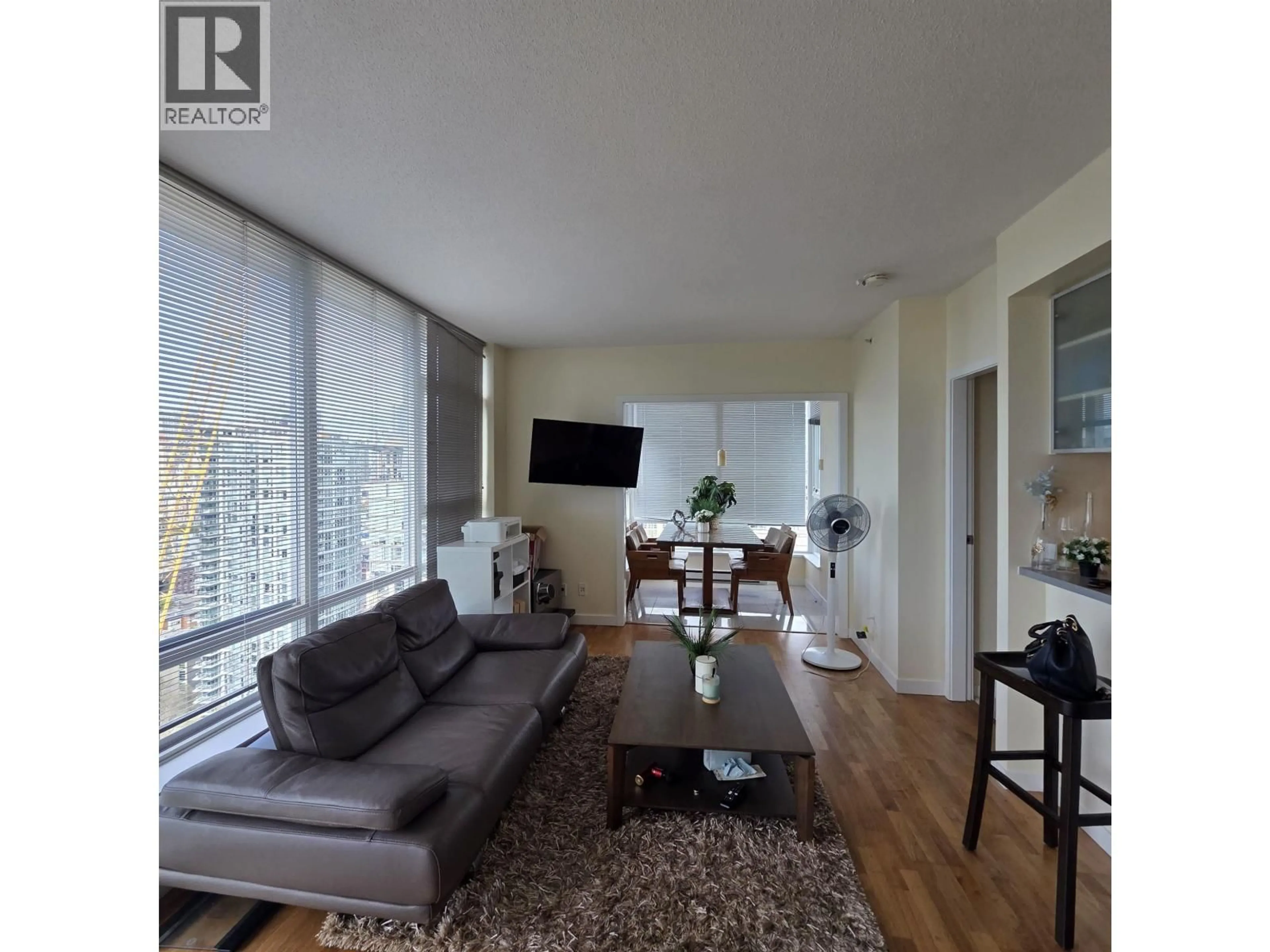 Living room with furniture, wood/laminate floor for 3008 - 939 EXPO BOULEVARD, Vancouver British Columbia V6Z3G7