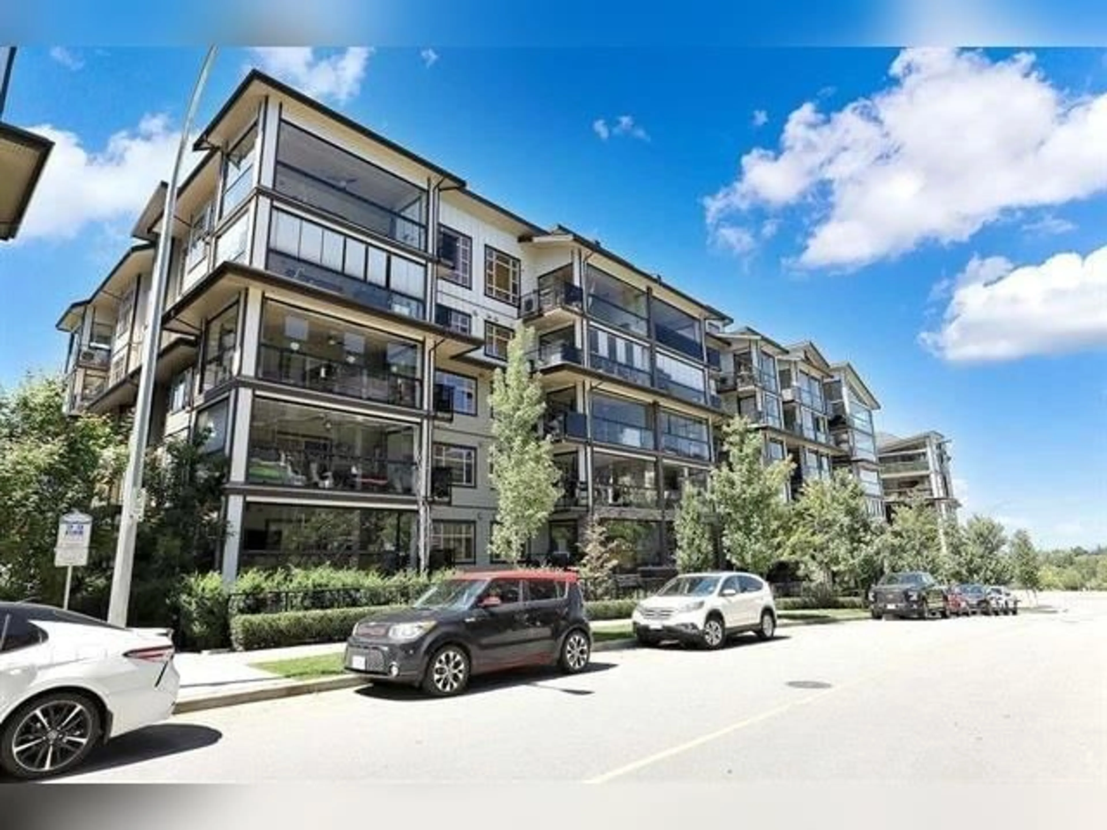 A pic from outside/outdoor area/front of a property/back of a property/a pic from drone, street for 405 - 8561 203A STREET, Langley British Columbia V2Y3L7