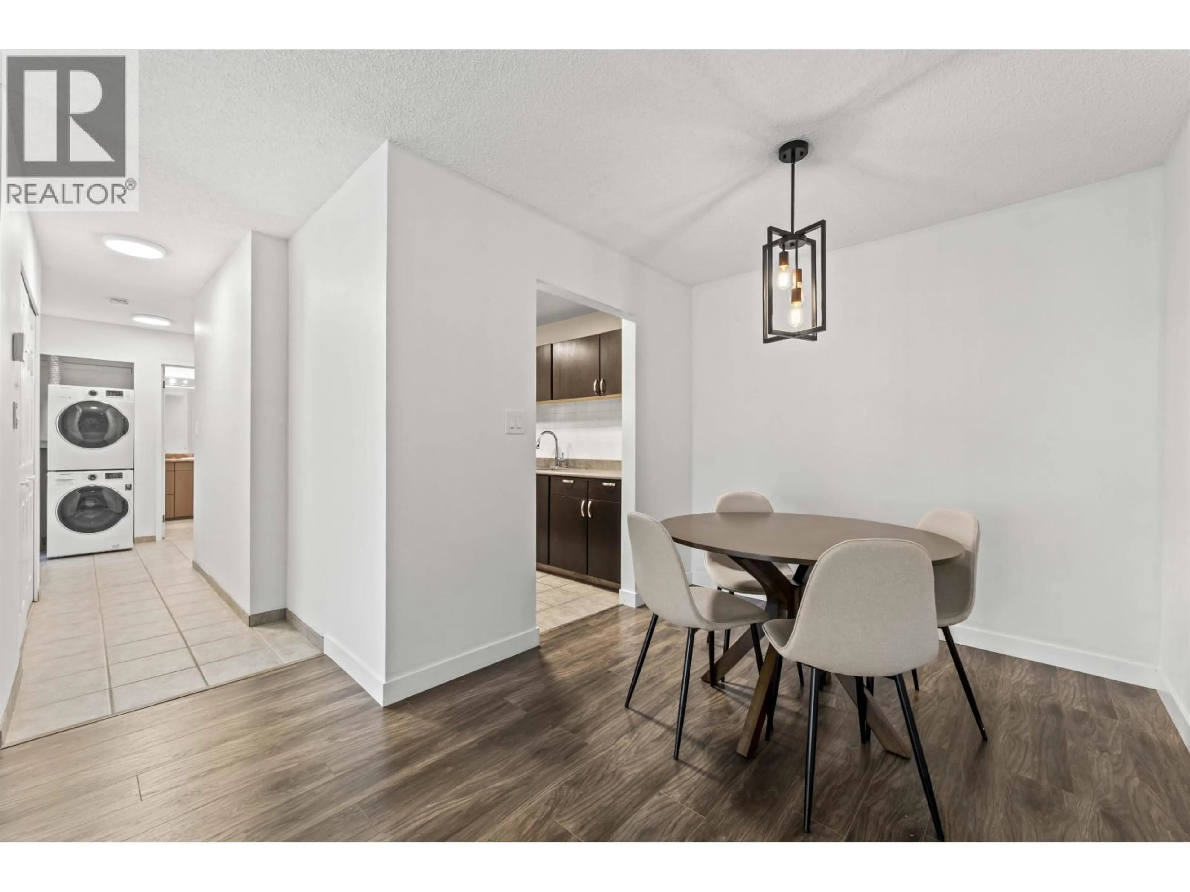 Dining room, wood/laminate floor for 302 - 5800 COONEY ROAD, Richmond British Columbia V6X3A8