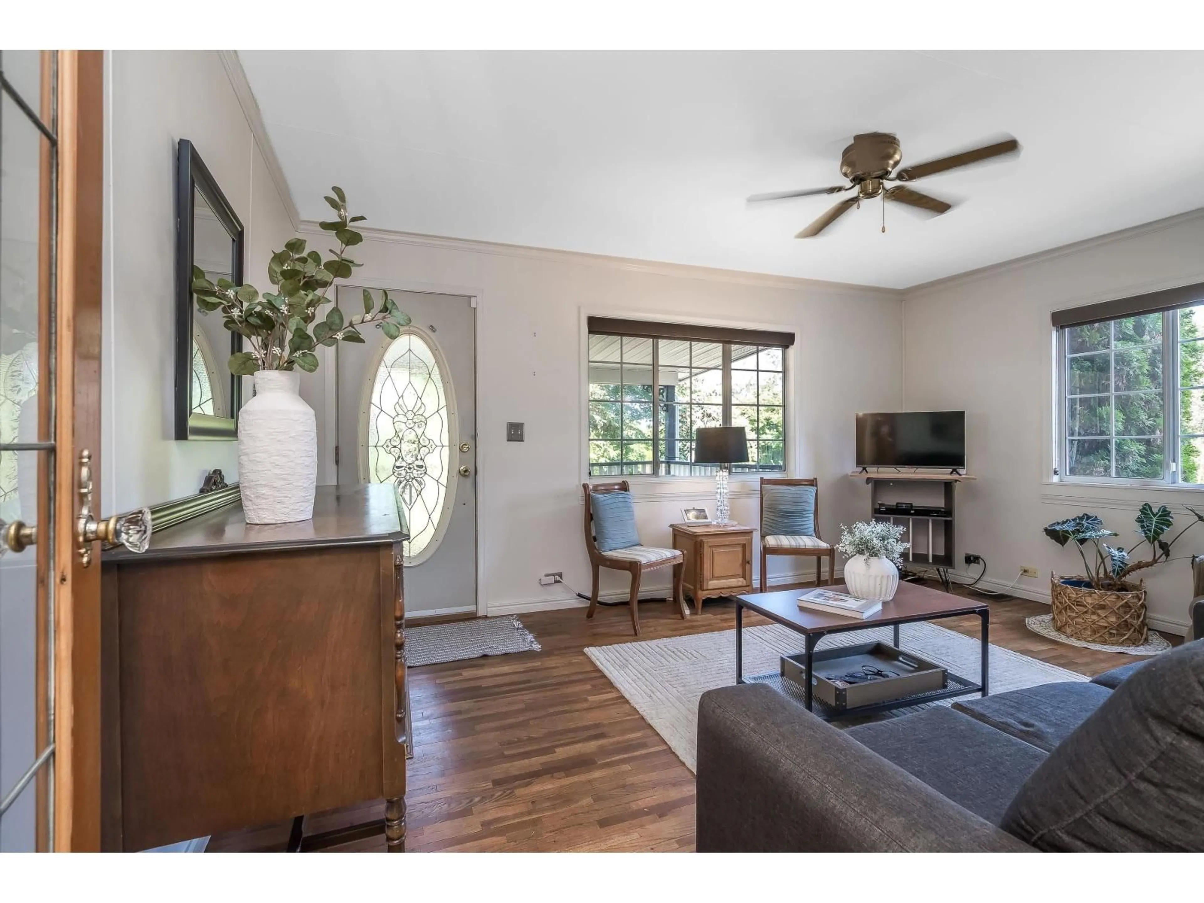 Living room with furniture, wood/laminate floor for 8992 ROYAL STREET, Langley British Columbia V1M2R9