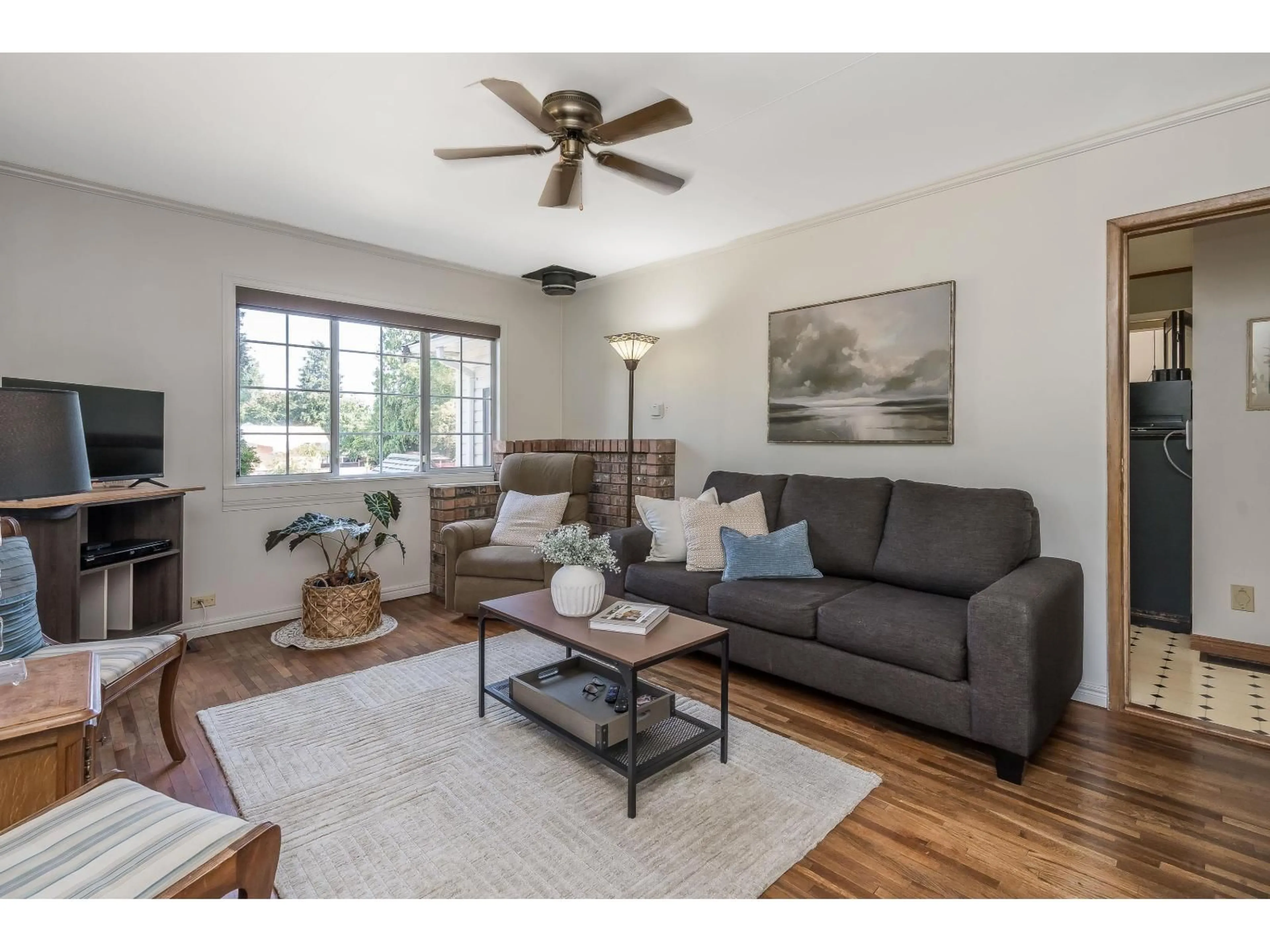 Living room with furniture, wood/laminate floor for 8992 ROYAL STREET, Langley British Columbia V1M2R9