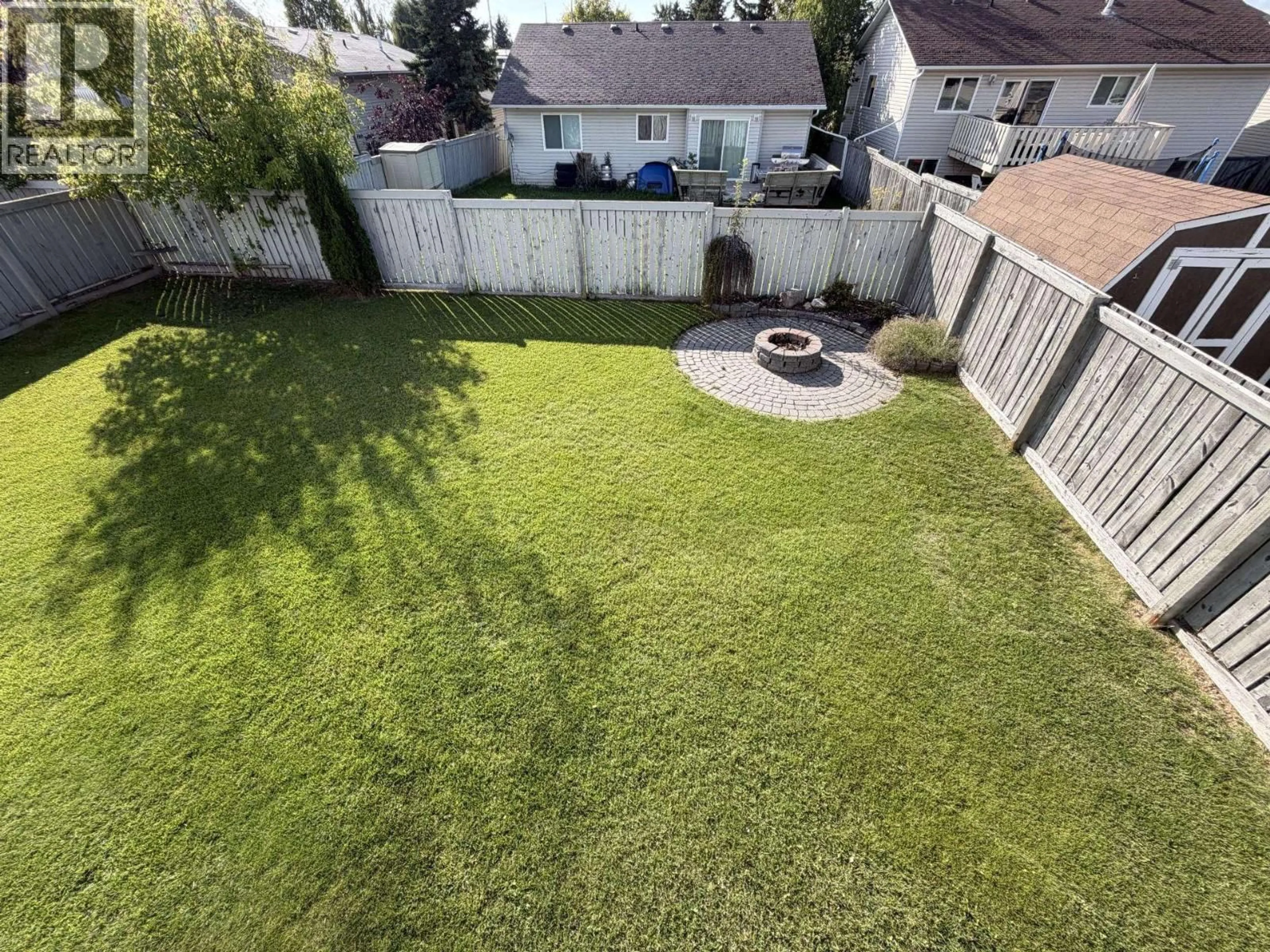 A pic from outside/outdoor area/front of a property/back of a property/a pic from drone, street for 11328 97 STREET, Fort St. John British Columbia V1J7H8