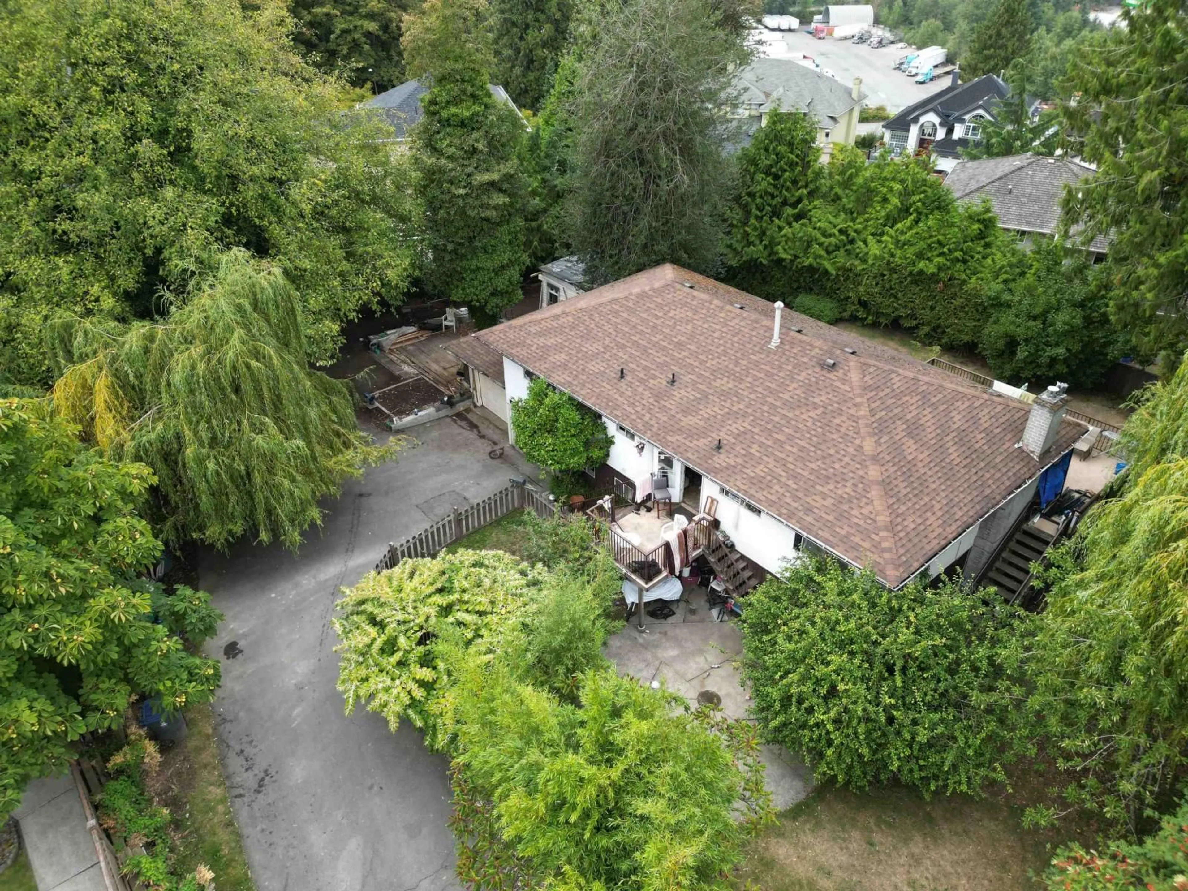 A pic from outside/outdoor area/front of a property/back of a property/a pic from drone, street for 9947 116A STREET, Surrey British Columbia V3V7K5