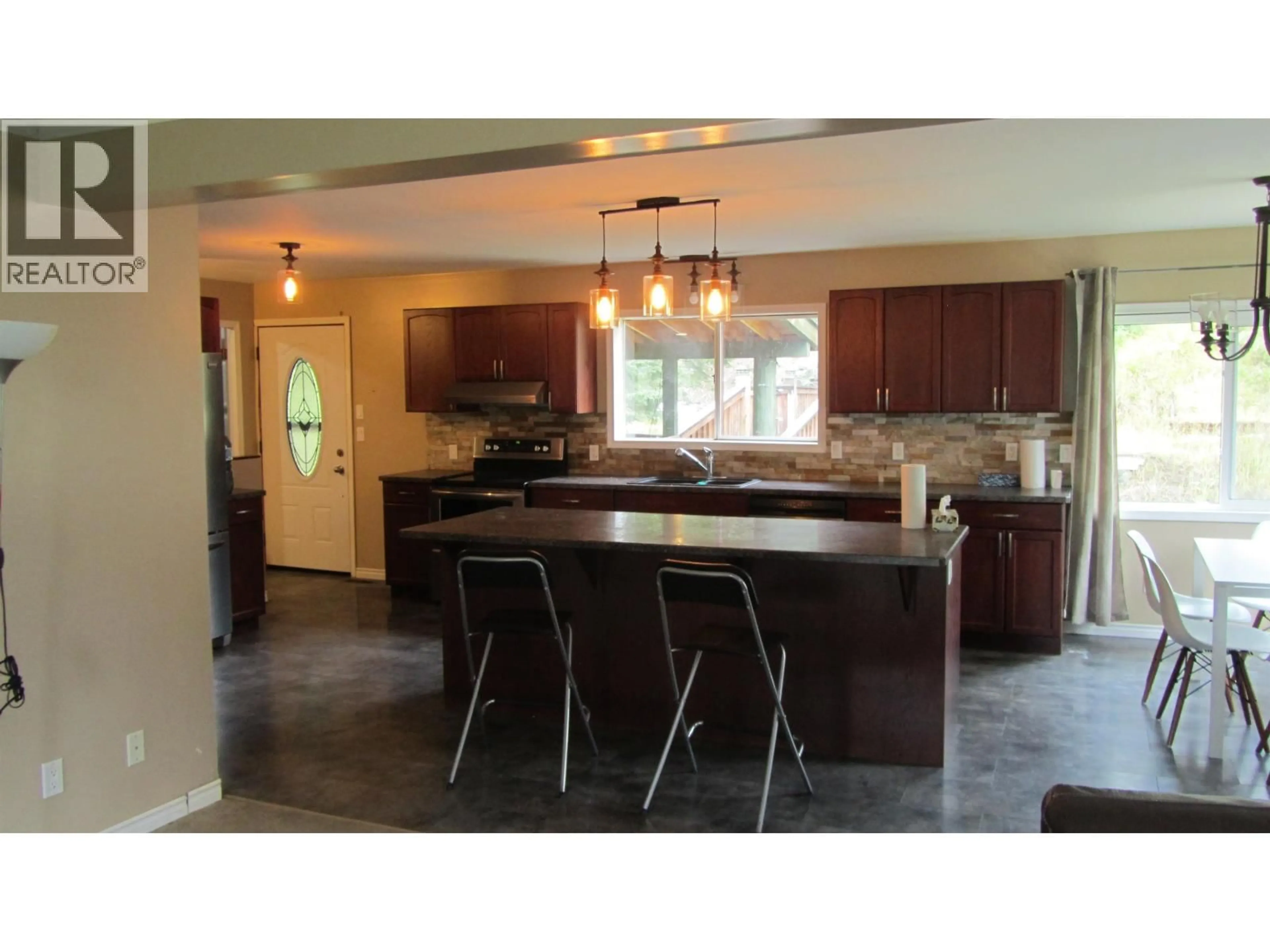 Open concept kitchen, ceramic/tile floor for 6108 LONE BUTTE HORSE LAKE ROAD, 100 Mile House British Columbia V0K1X3
