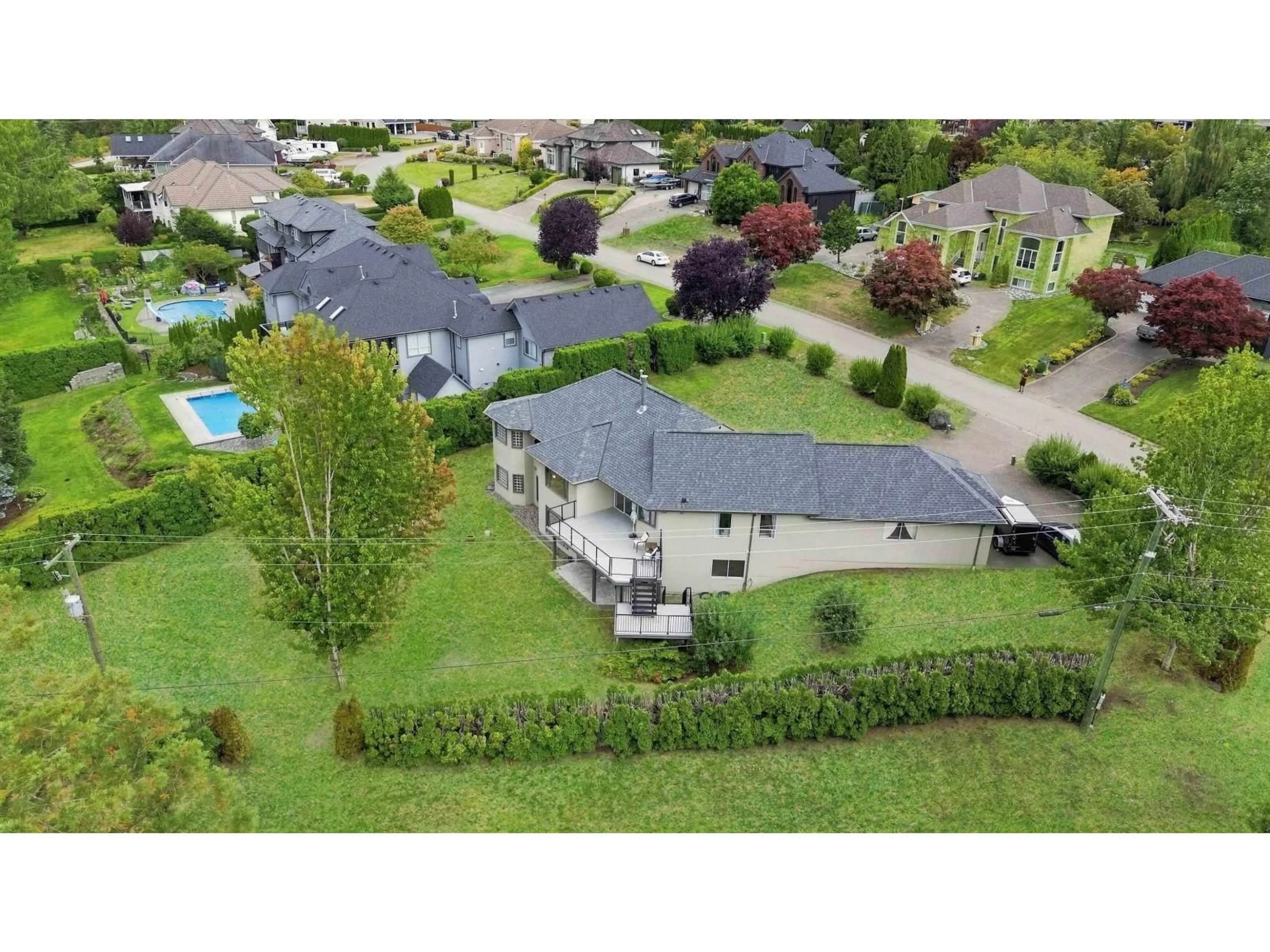 A pic from outside/outdoor area/front of a property/back of a property/a pic from drone, street for 4320 ESTATE DRIVE, Sardis - Chwk River Valley British Columbia V2R3B4