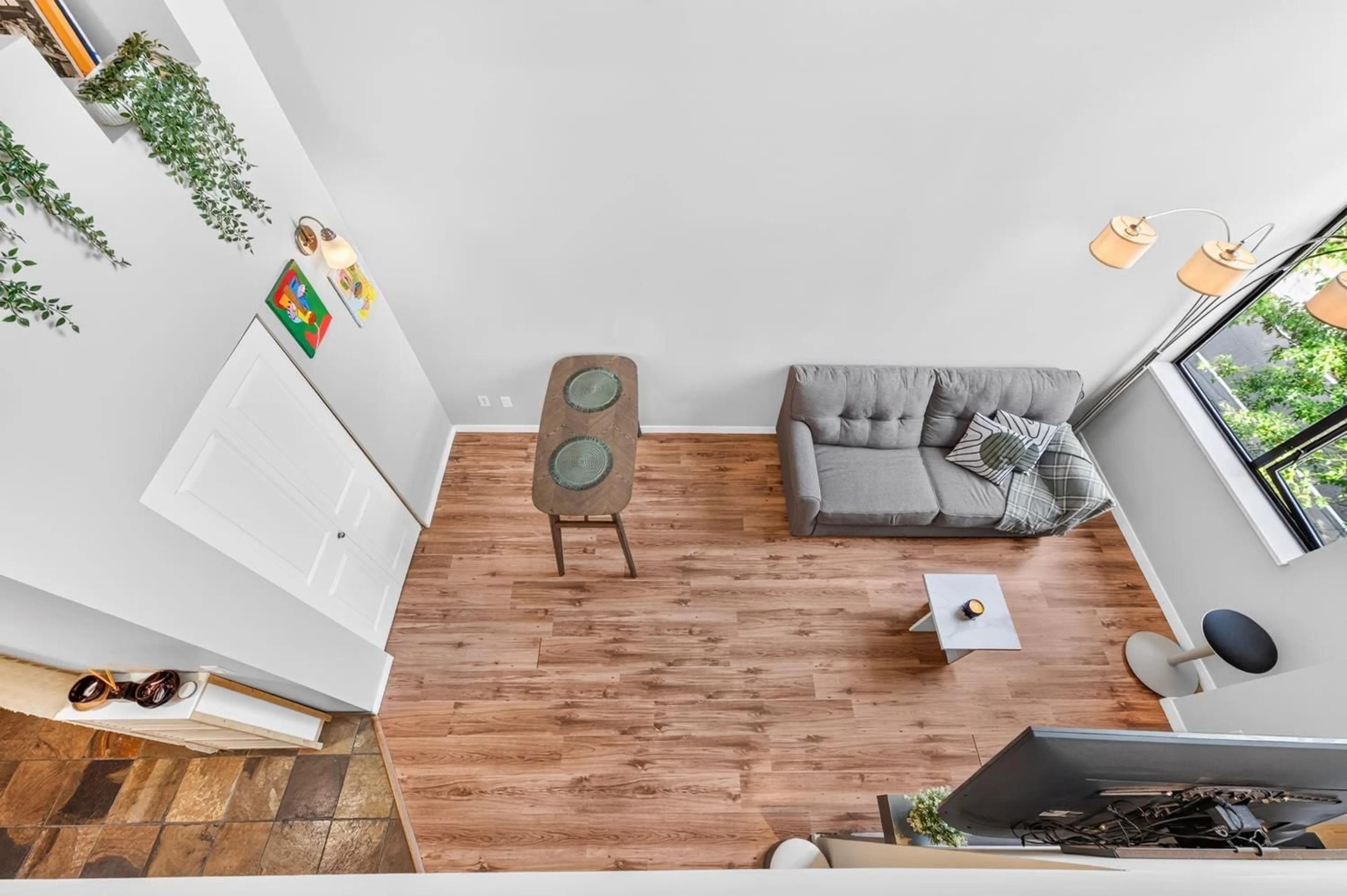 Living room with furniture, wood/laminate floor for 416 - 10866 CITY PARKWAY, Surrey British Columbia V3T5W9