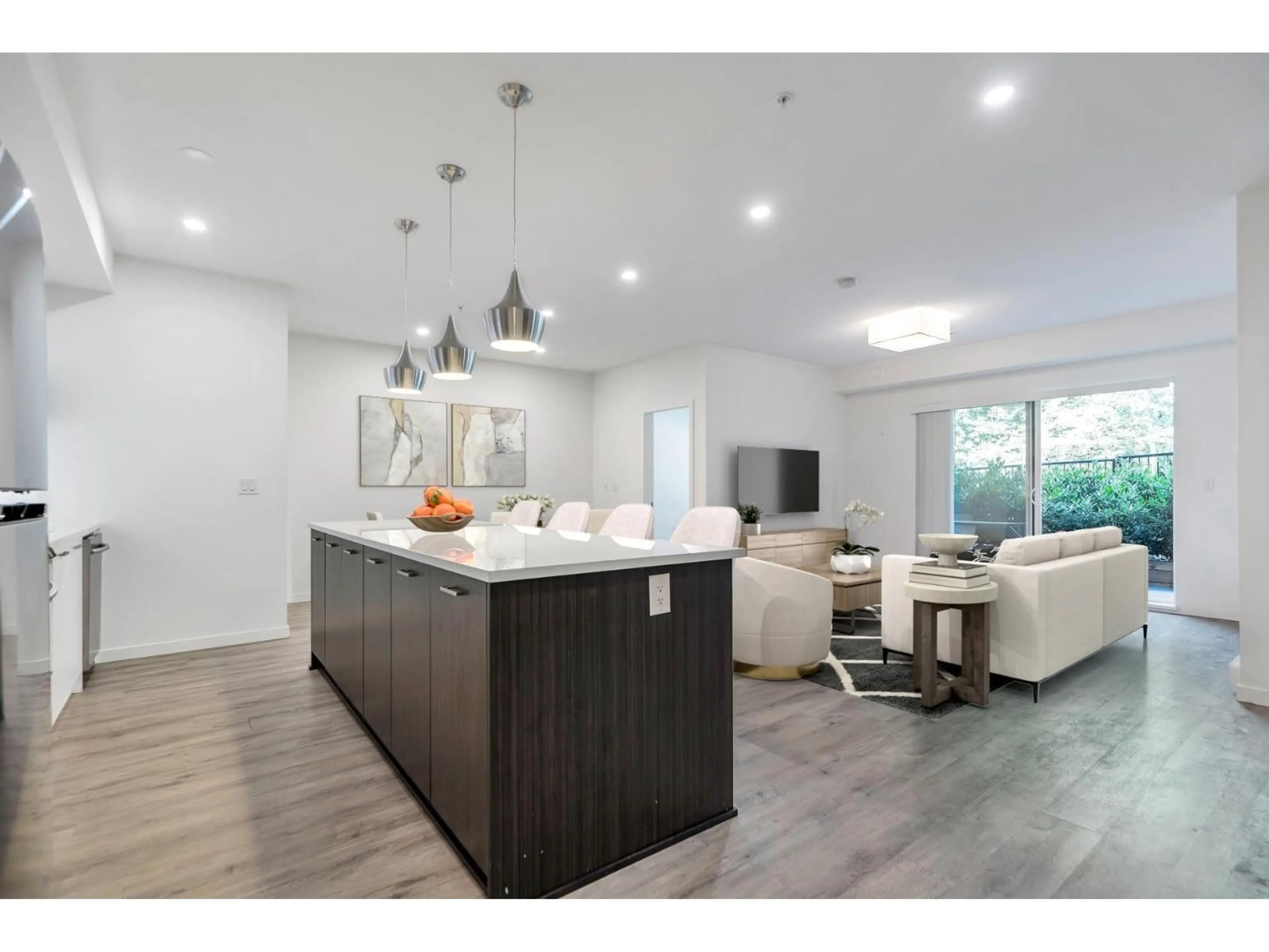 Open concept kitchen, wood/laminate floor for B005 - 20087 68 AVENUE, Langley British Columbia V2Y0Y3